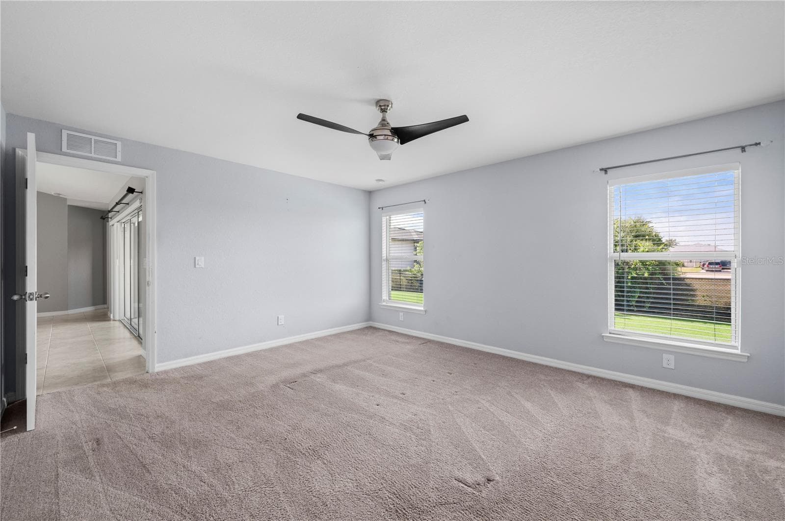 Primary Bedroom with Neutral Carpet - 4302 NW 32ND ST, CAPE CORAL