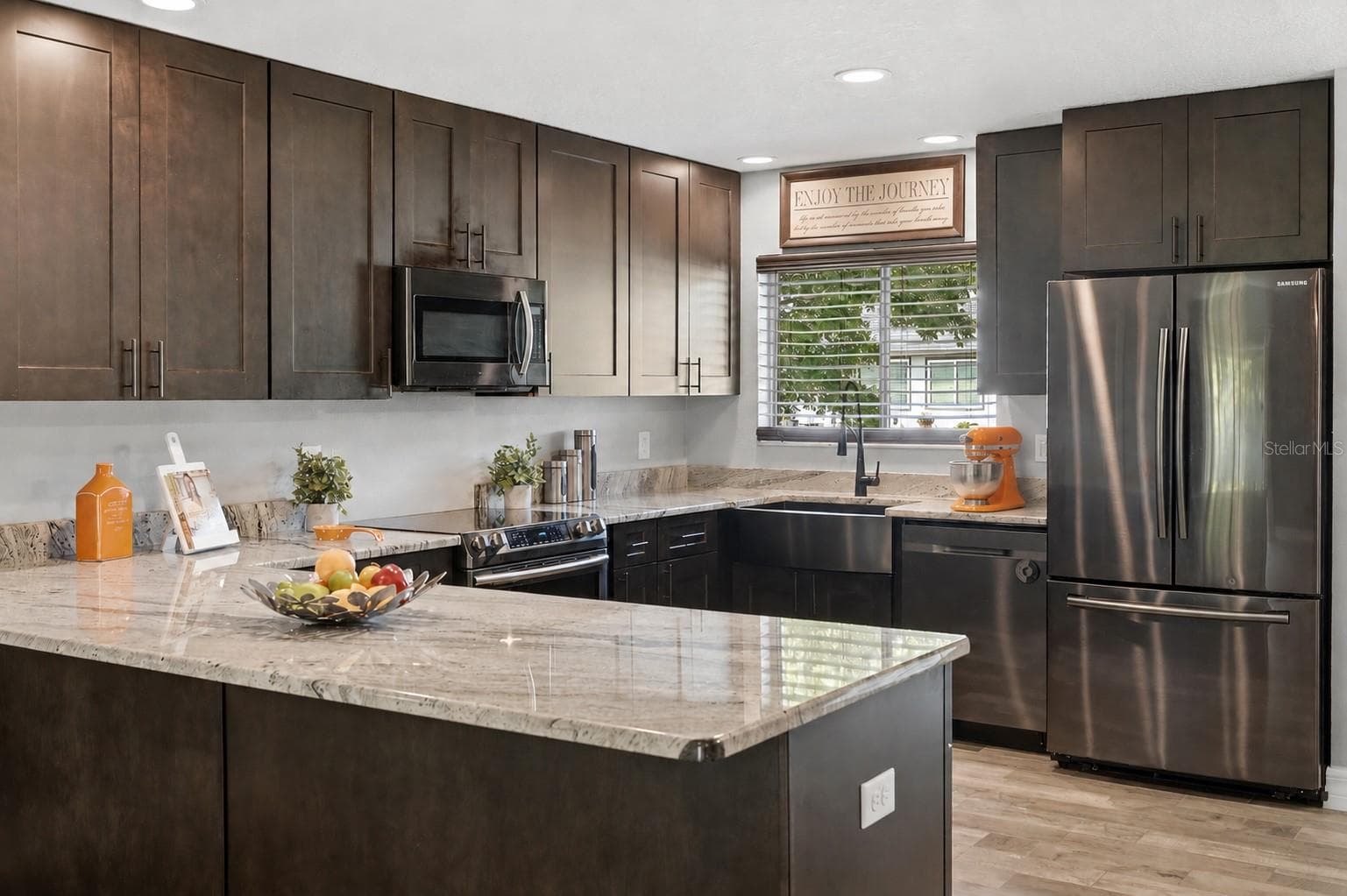 Kitchen with Generous Storage and prep space. - 10702 WILLIAM TELL DR, ORLANDO