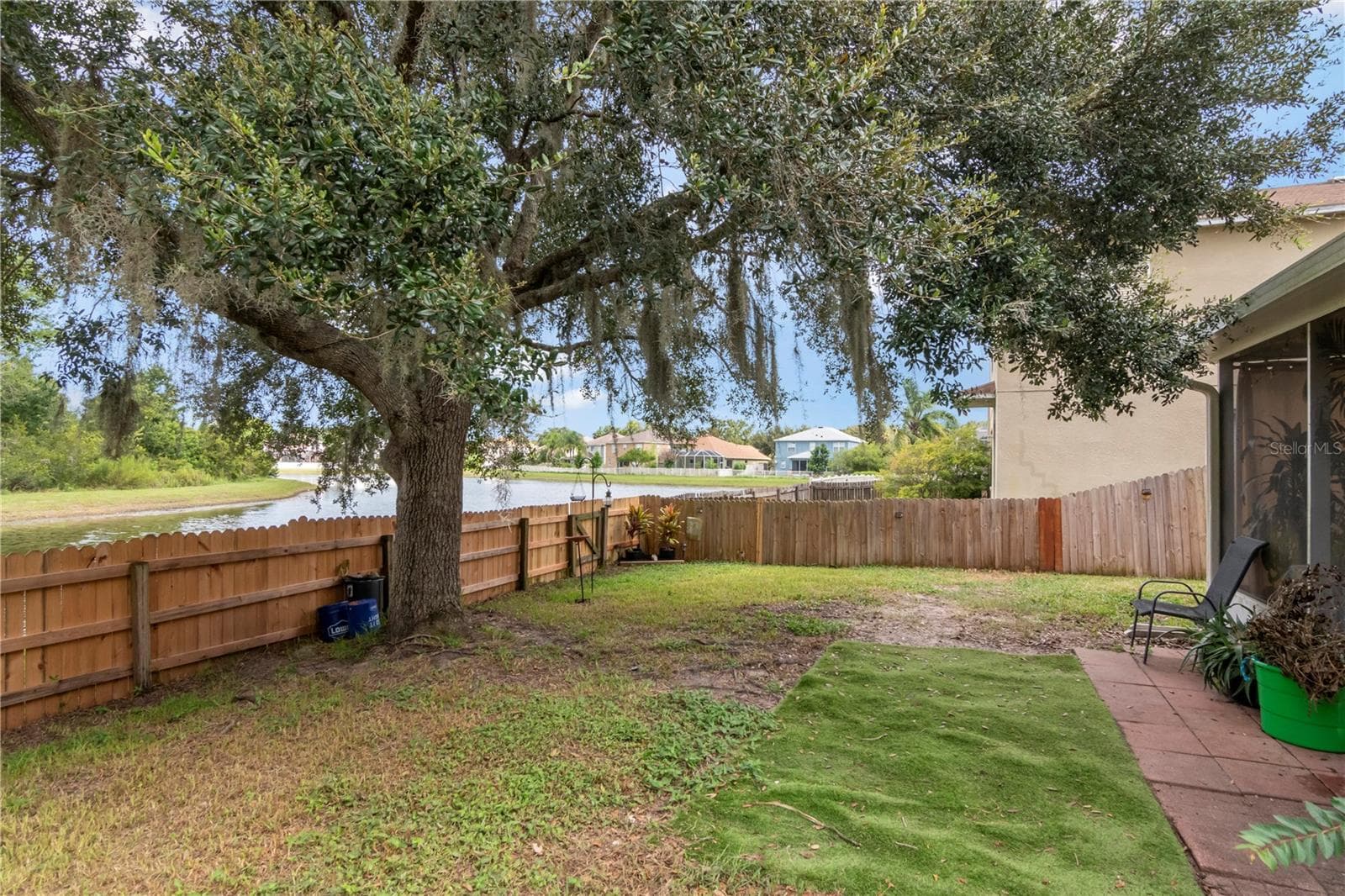 fenced backyard - 19604 TIMBERBLUFF DR, LAND O LAKES