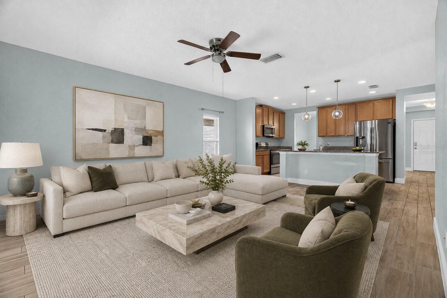 Virtually Staged Living Room with the view of the kitchen - 878 BENJAMIN TRL, DAVENPORT
