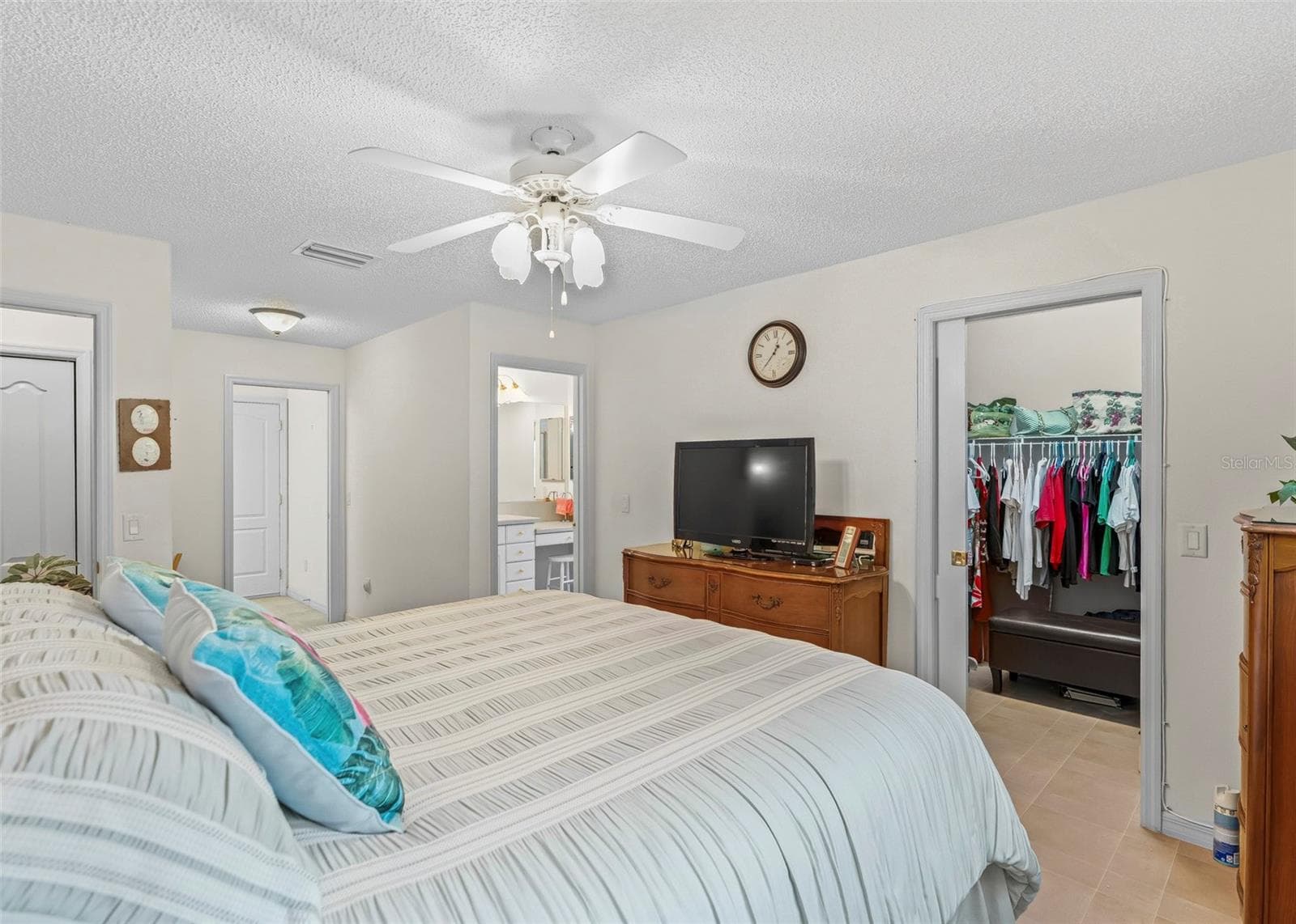 the whole picture of primary bedroom with walk in closet - 8368 SE 176TH LAWSON LOOP, THE VILLAGES