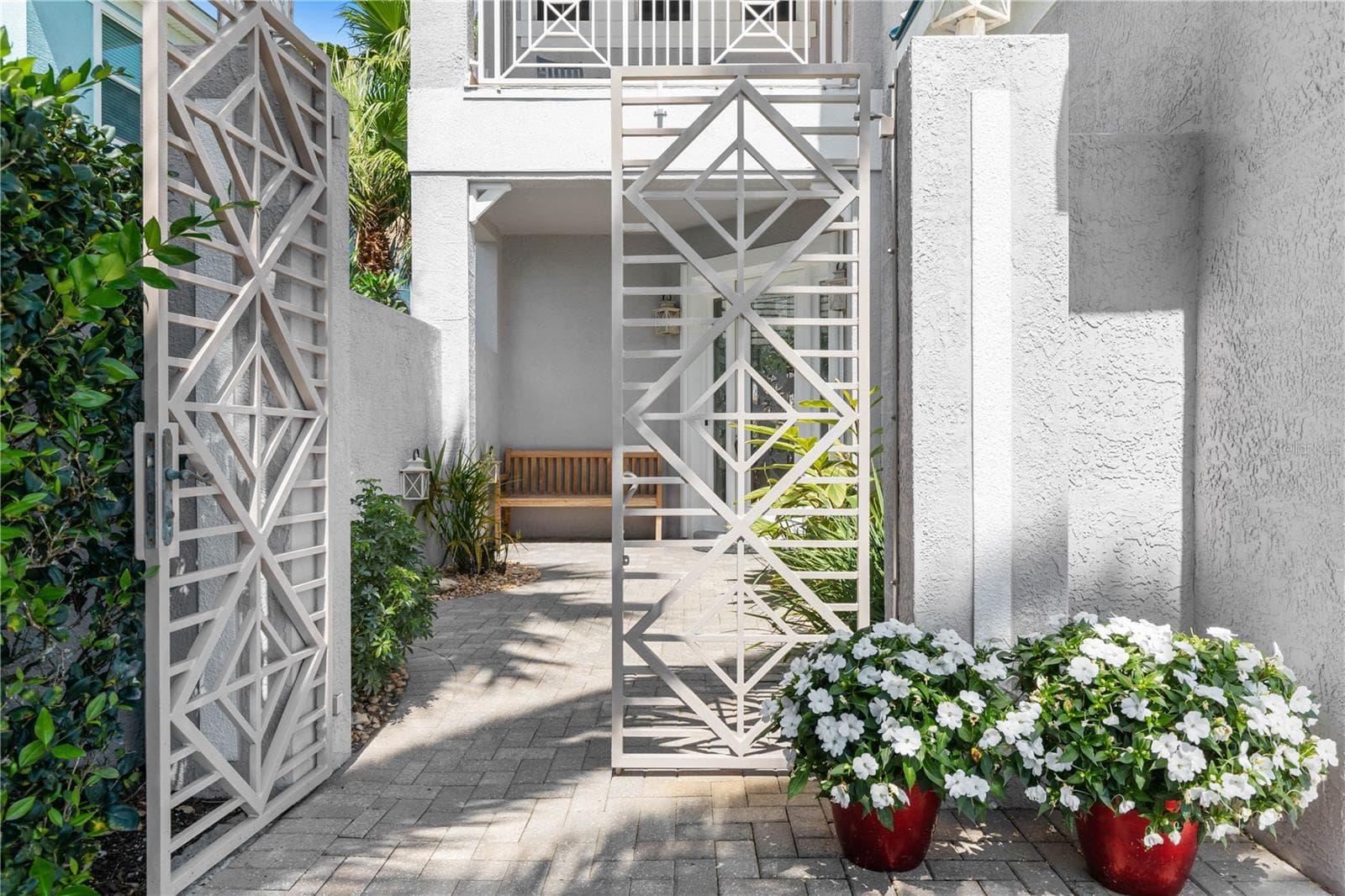 Gates that lead to front door - 12 CINNAMON BEACH WAY, PALM COAST