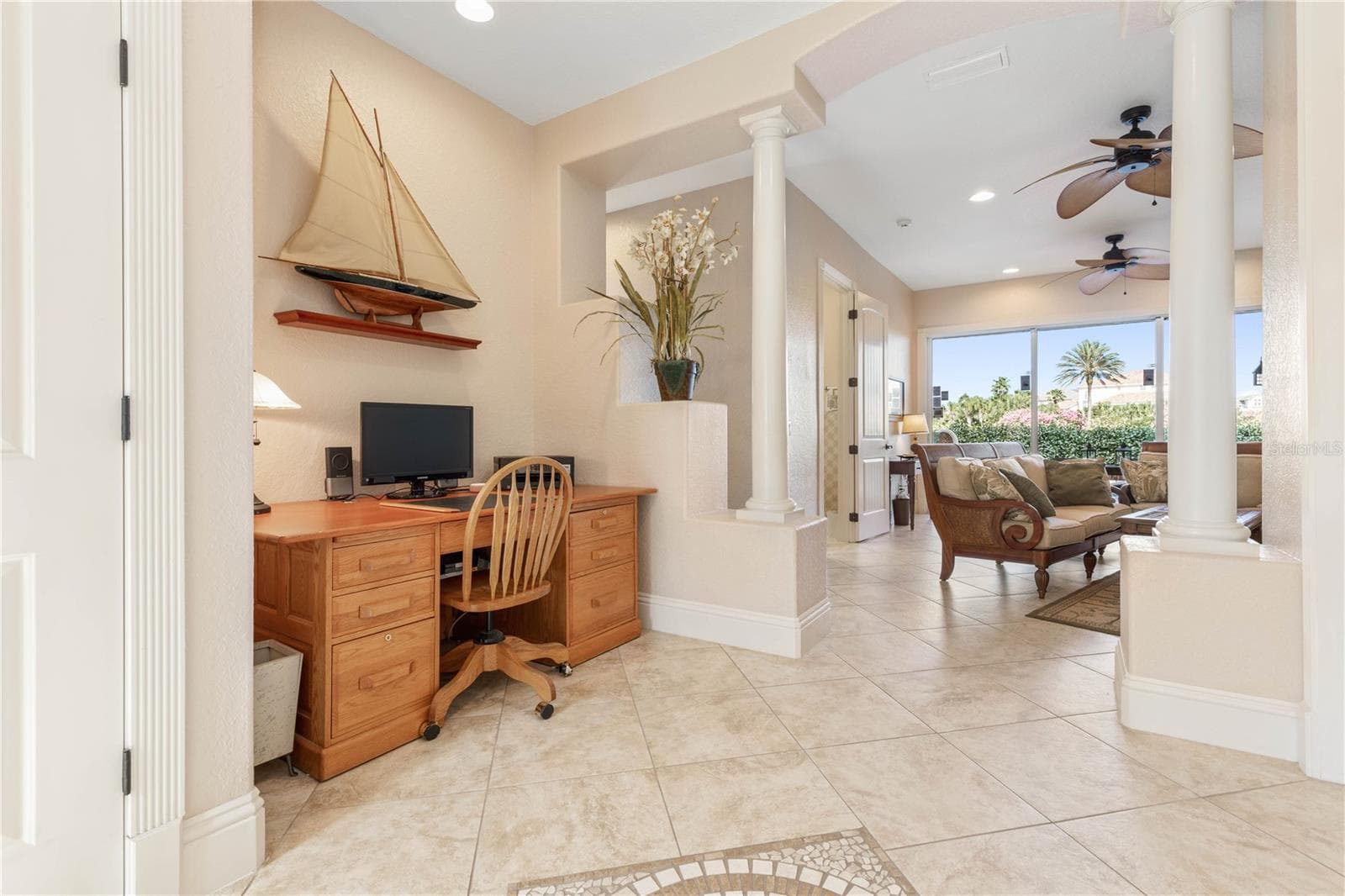 Front entryway with desk leads to family room - 12 CINNAMON BEACH WAY, PALM COAST