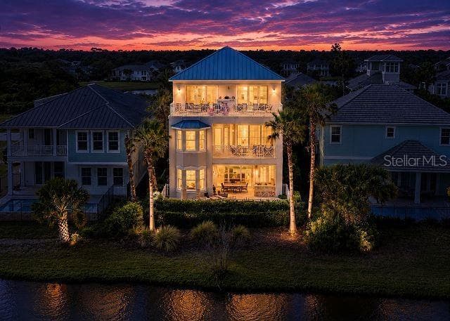 Back of 12 Cinnamon Beach Way twilight - 12 CINNAMON BEACH WAY, PALM COAST