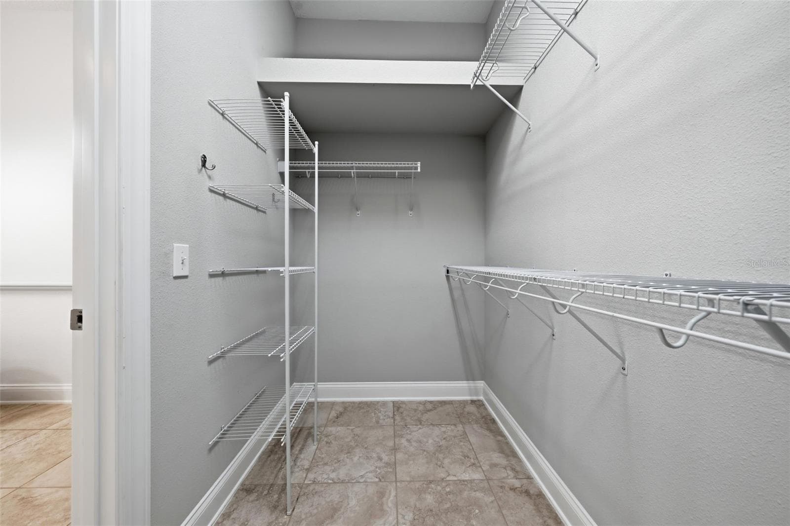 Spacious walk-in closet in Primary bathroom - 16716 ABBEY HILL CT, CLERMONT