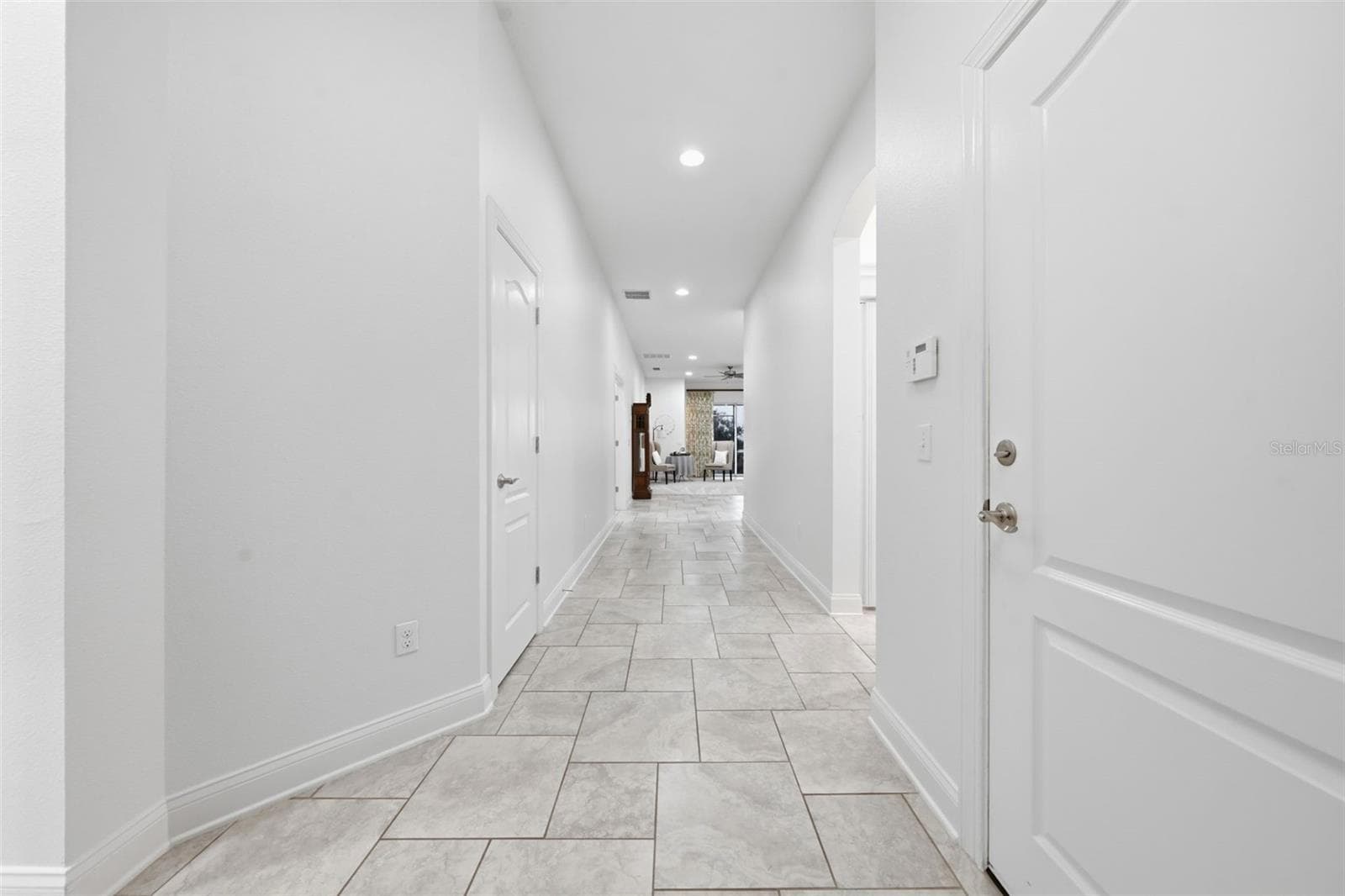 Front entry hallway leading into main area - 16716 ABBEY HILL CT, CLERMONT