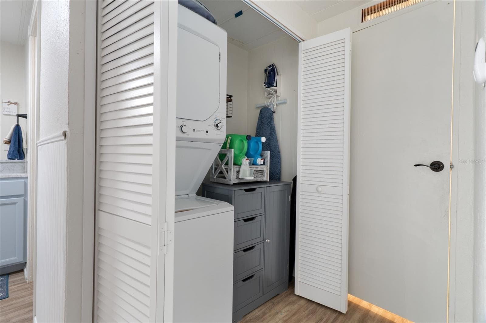 Laundry in one of two master closets - 12041 FAIRWAY AVE, BROOKSVILLE