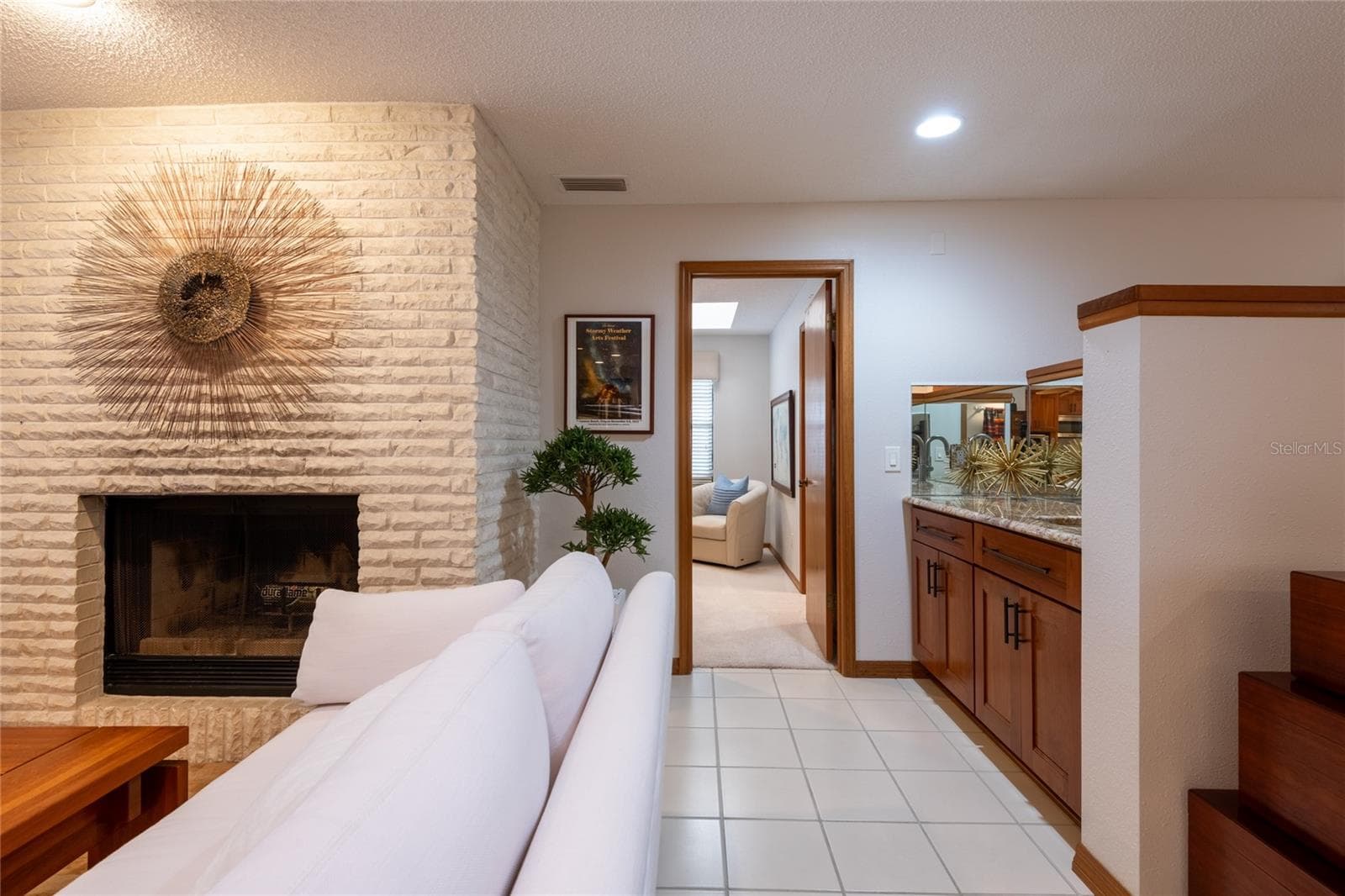 Second family room with wood burning fireplace - 16509 E COURSE DR, TAMPA
