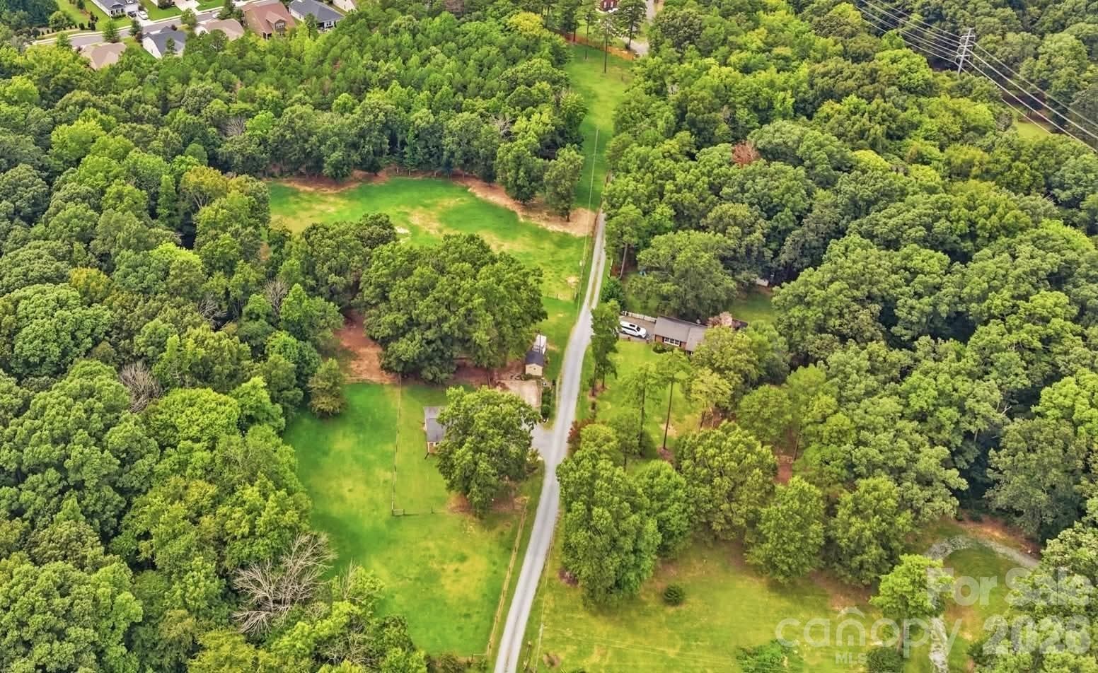 all 3 pastures, home is on left - 205 Airport Road, Monroe