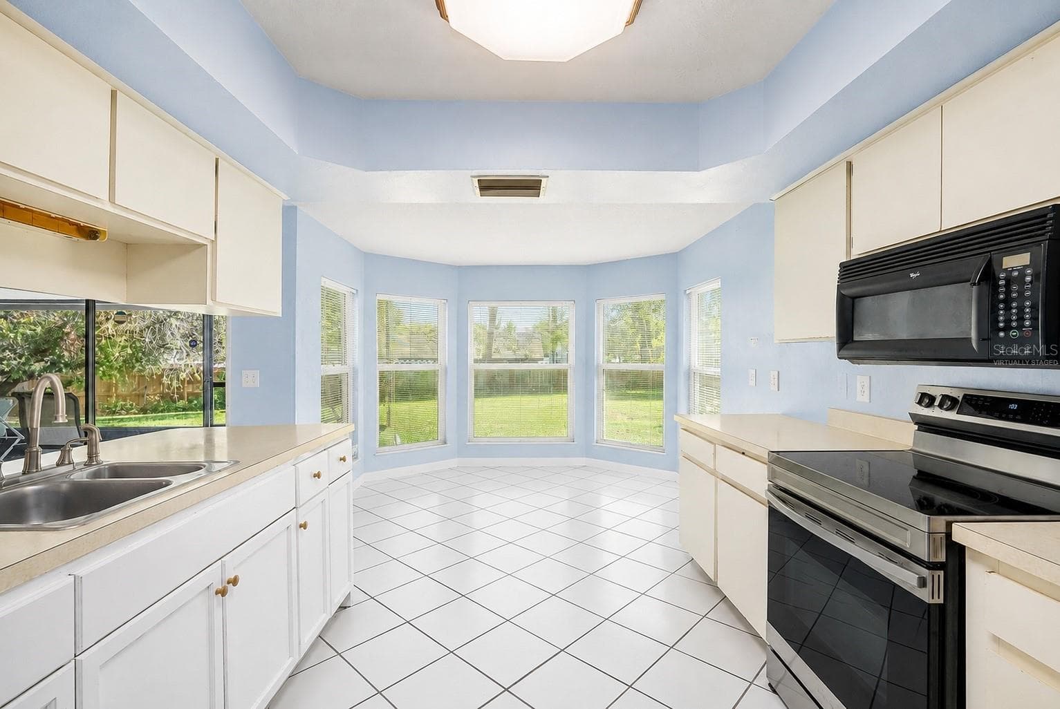 Virtually staged to show room empty and painted - 1606 DUSTY ROSE LN, BRANDON