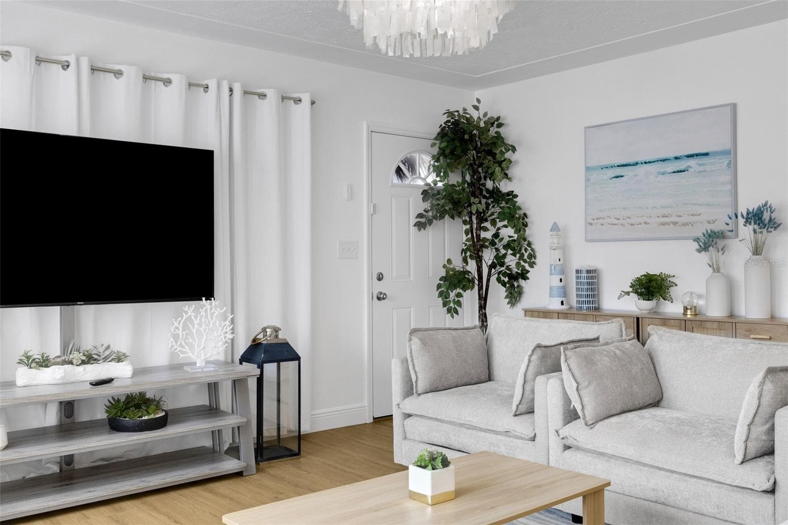 Comfortable living space designed for relaxing after a day at the beach. - 18317 SUNSET BLVD, REDINGTON SHORES