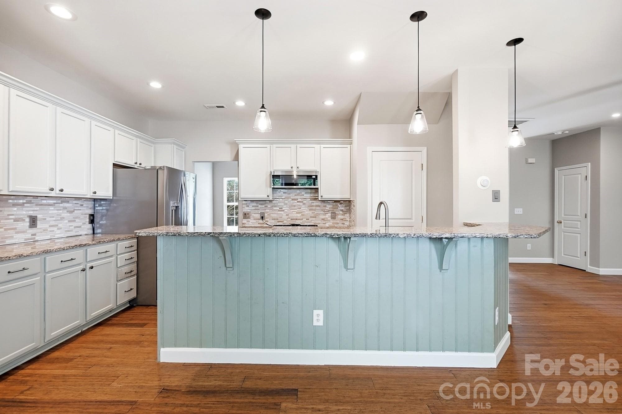 Island with Breakfast bar - 11402 Heritage Green Drive, Cornelius