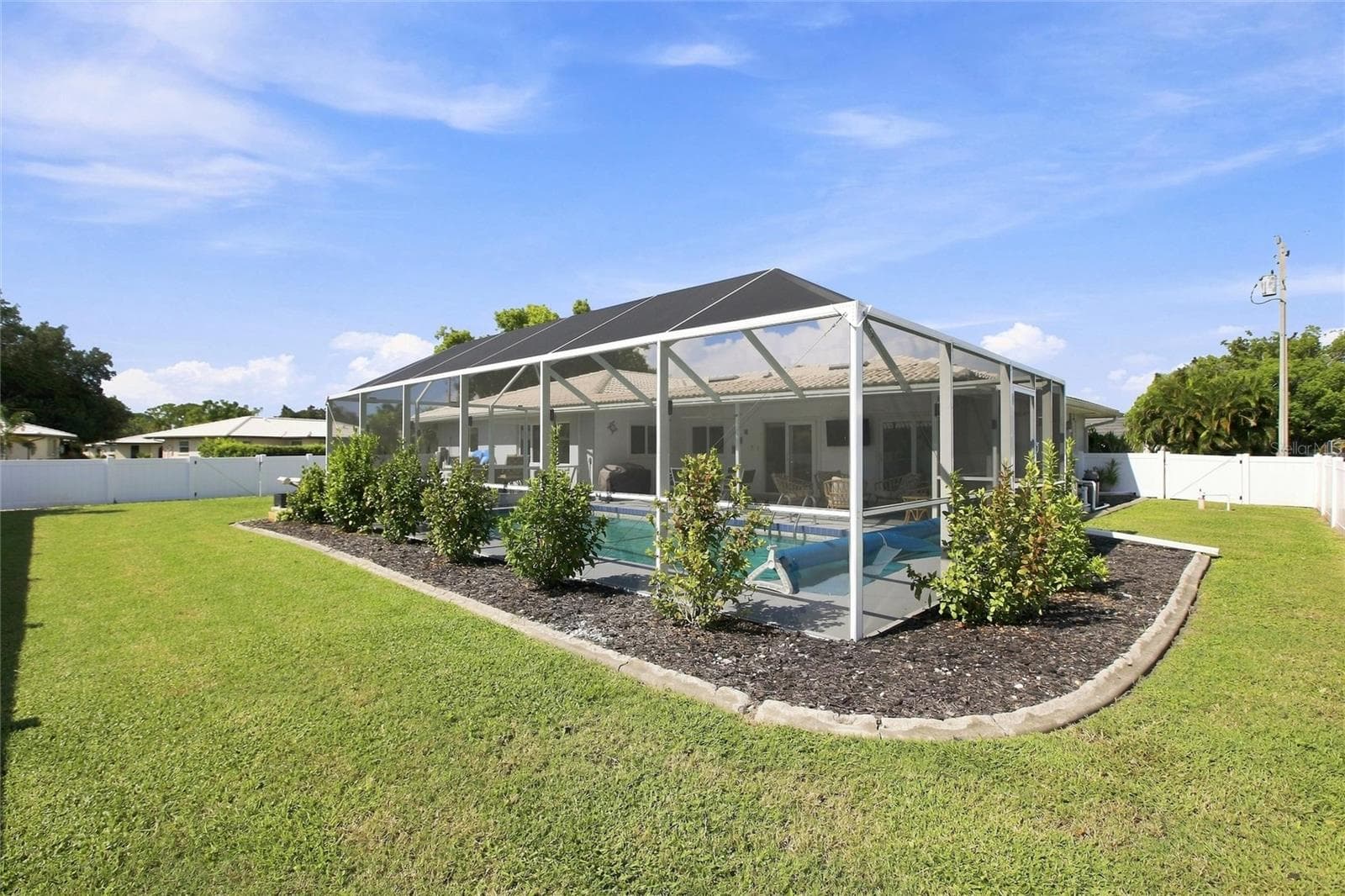 Rear of home - 302 DEGAS DR, NOKOMIS