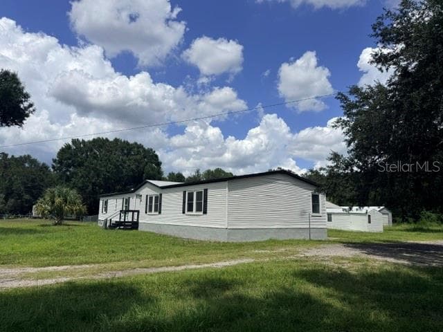 Manufactured Home at 5118 BENNETT DR, LAKELAND, photo 3 of 27