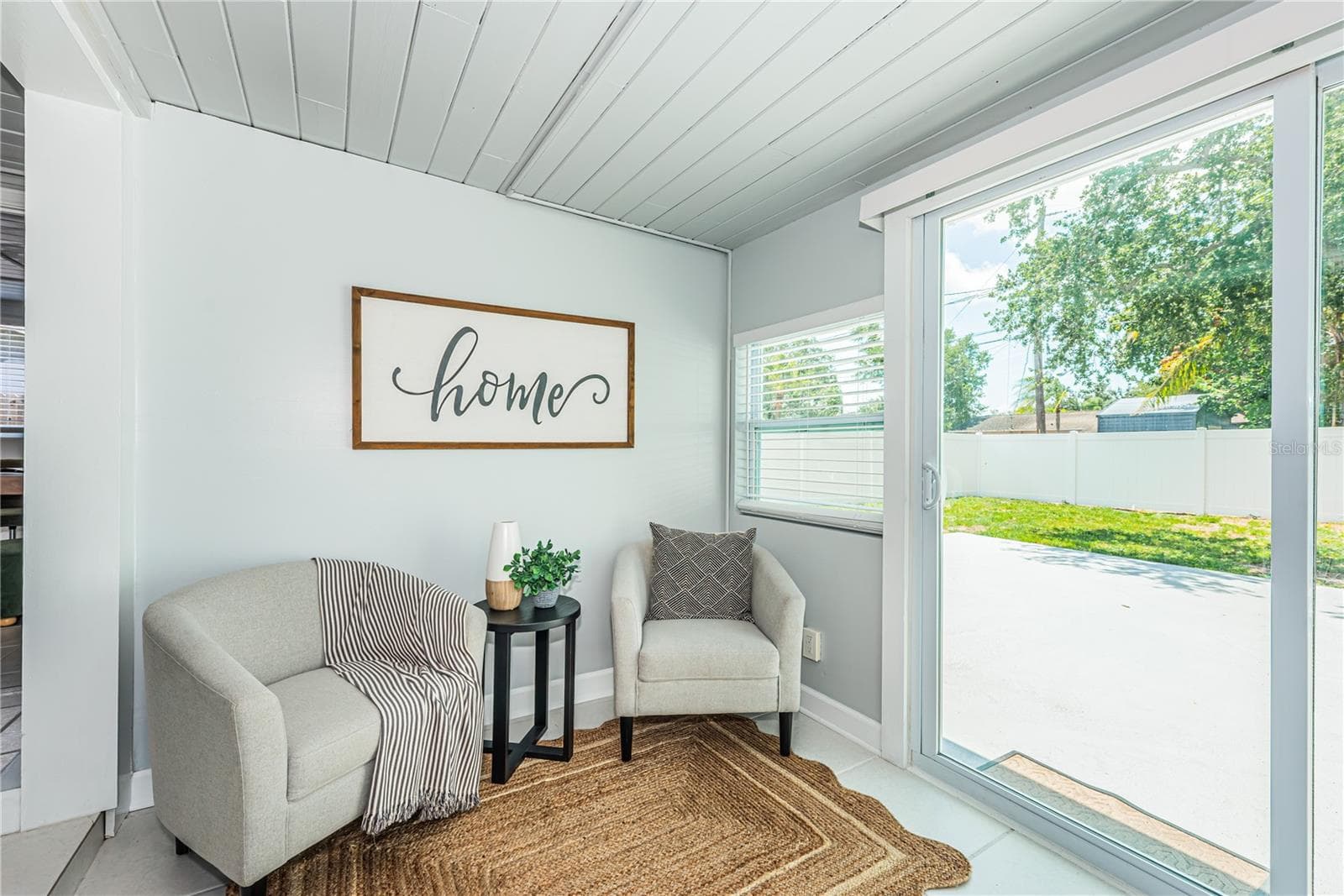 Family Room & Exits to Back Yard & Driveway - 262 40 AVE NE, ST PETERSBURG