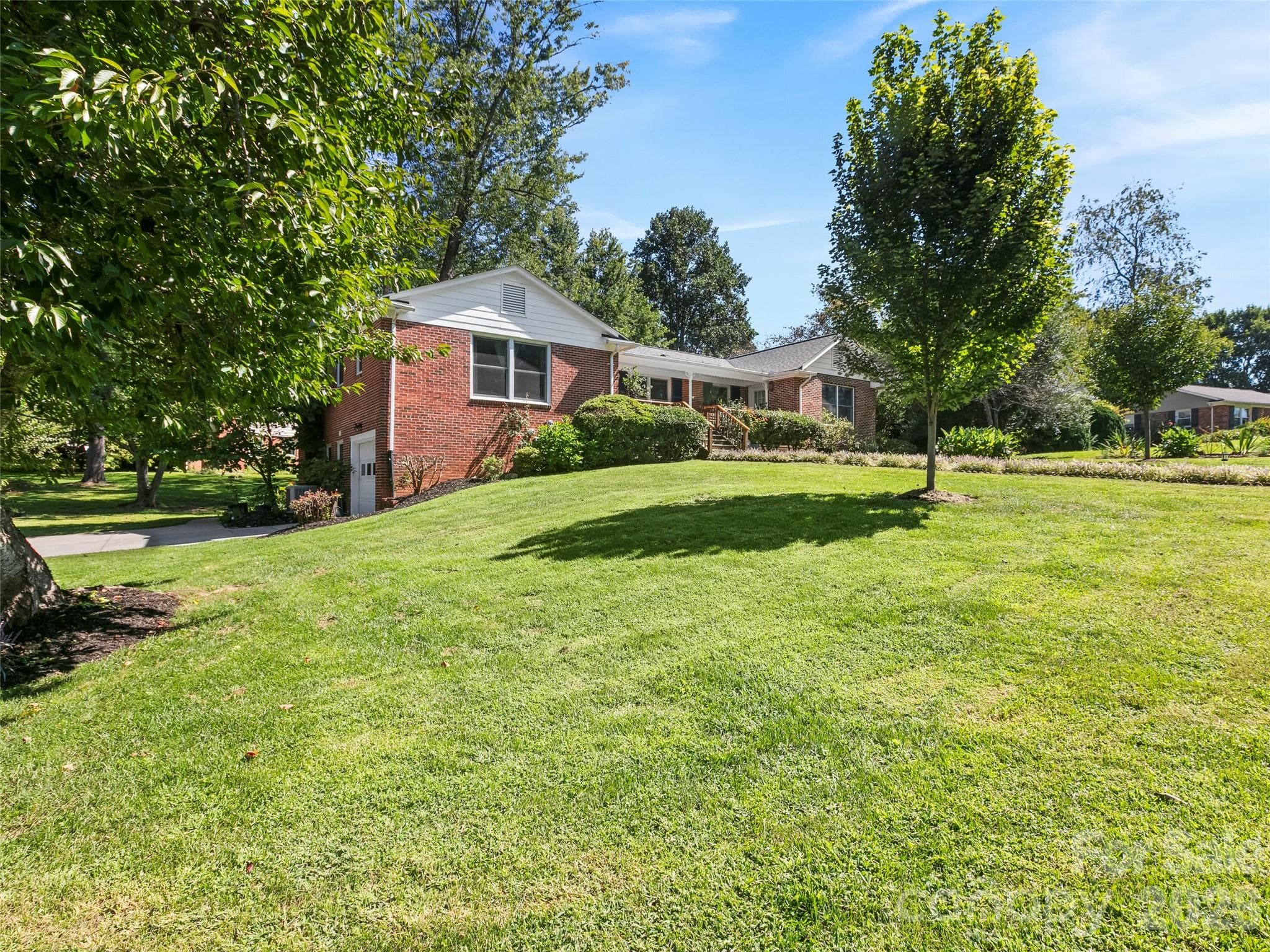 View of the front and garage - 101 Castlerock Drive, Asheville