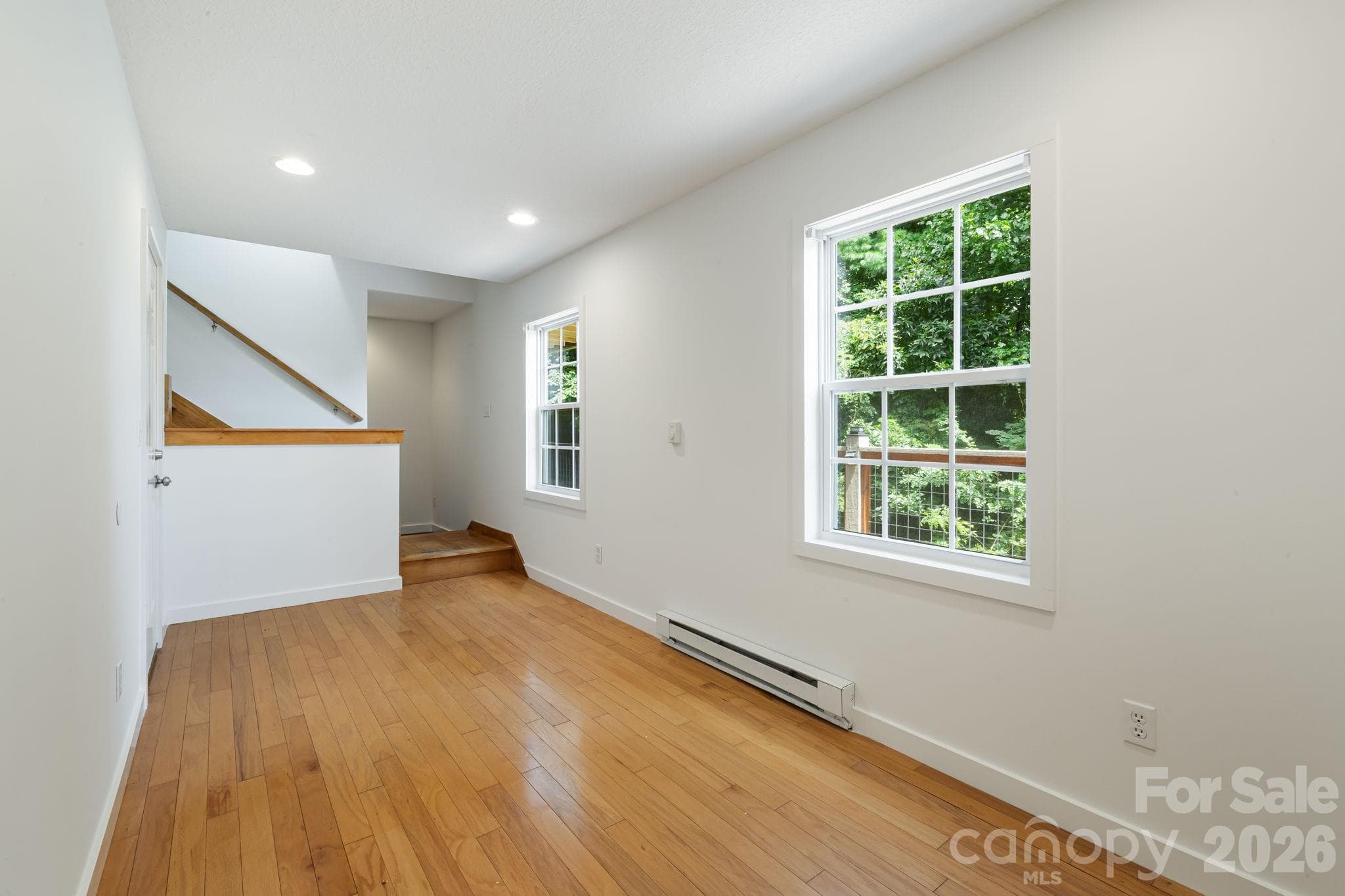 Large area at the bottom of the stair where the current owners had it set up as an office - 184 Scarlett Ridge Drive, Marshall