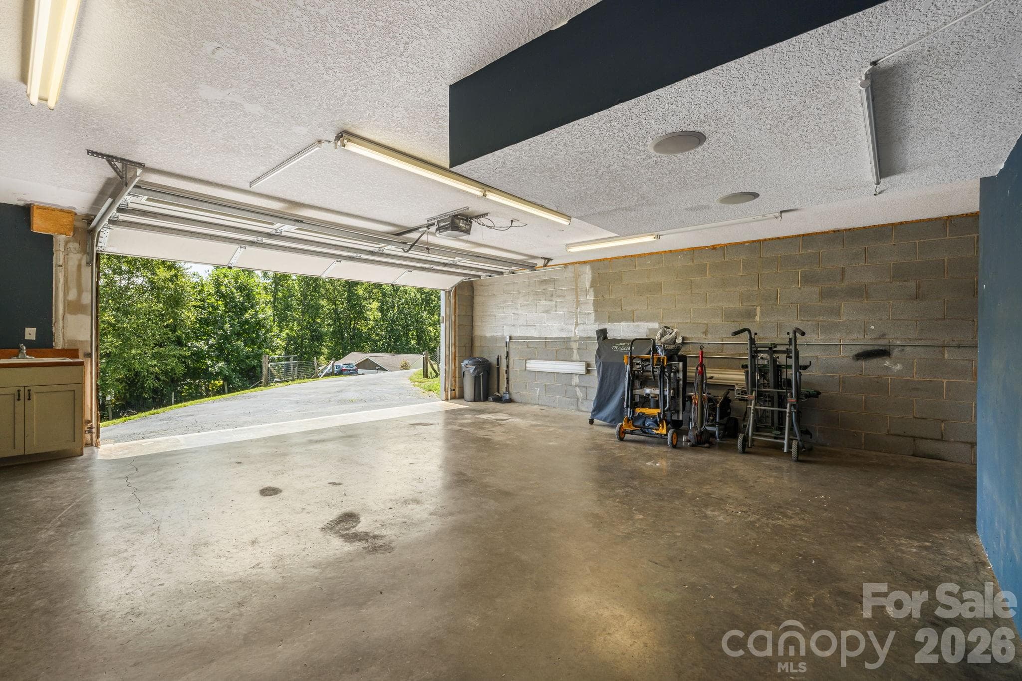 2 car garage with additional storage areas - 184 Scarlett Ridge Drive, Marshall
