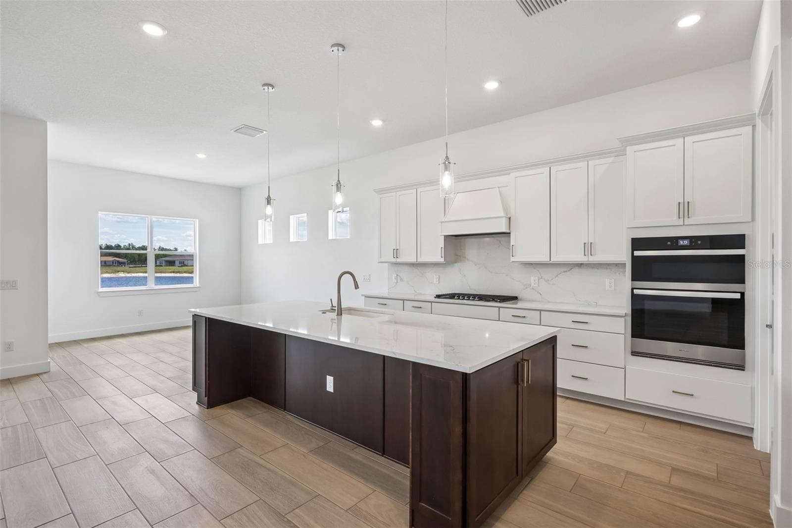 Open Kitchen to Cafe - 16694 HARVEST LEAF RD, SPRING HILL