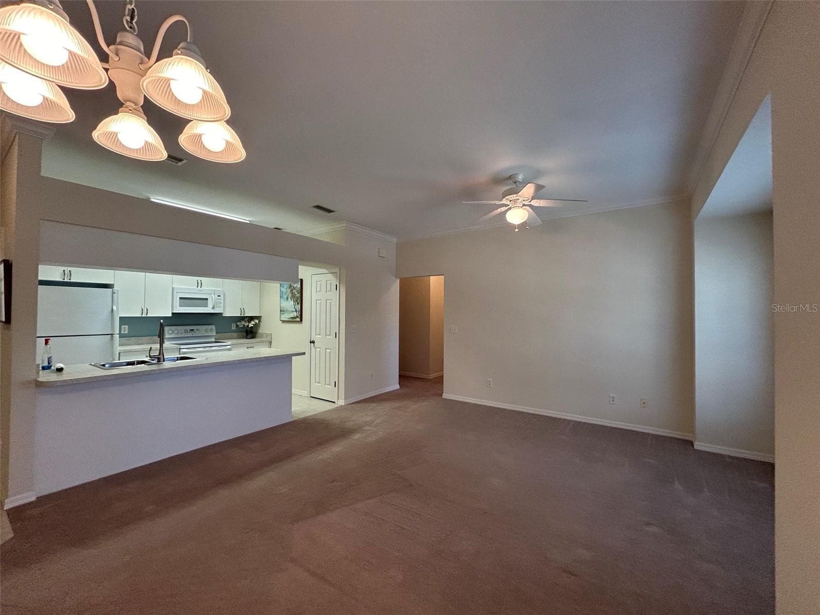 Dining view into Kitchen and Living - 508 EAGLE POND DR #508, WINTER HAVEN