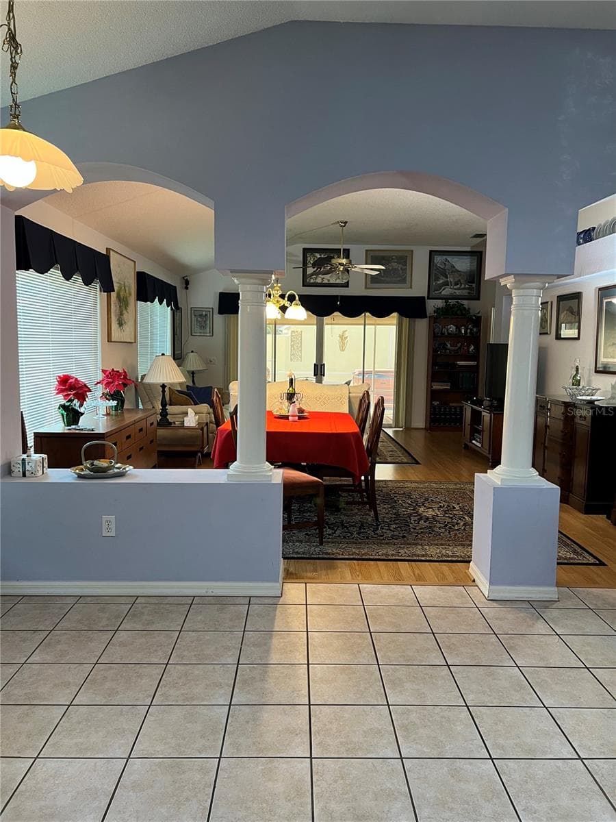 View from Kitchen/Eat-in-Kitchen into the Combo Dining/Living Room - 1842 PUERTO BELLO DR, THE VILLAGES