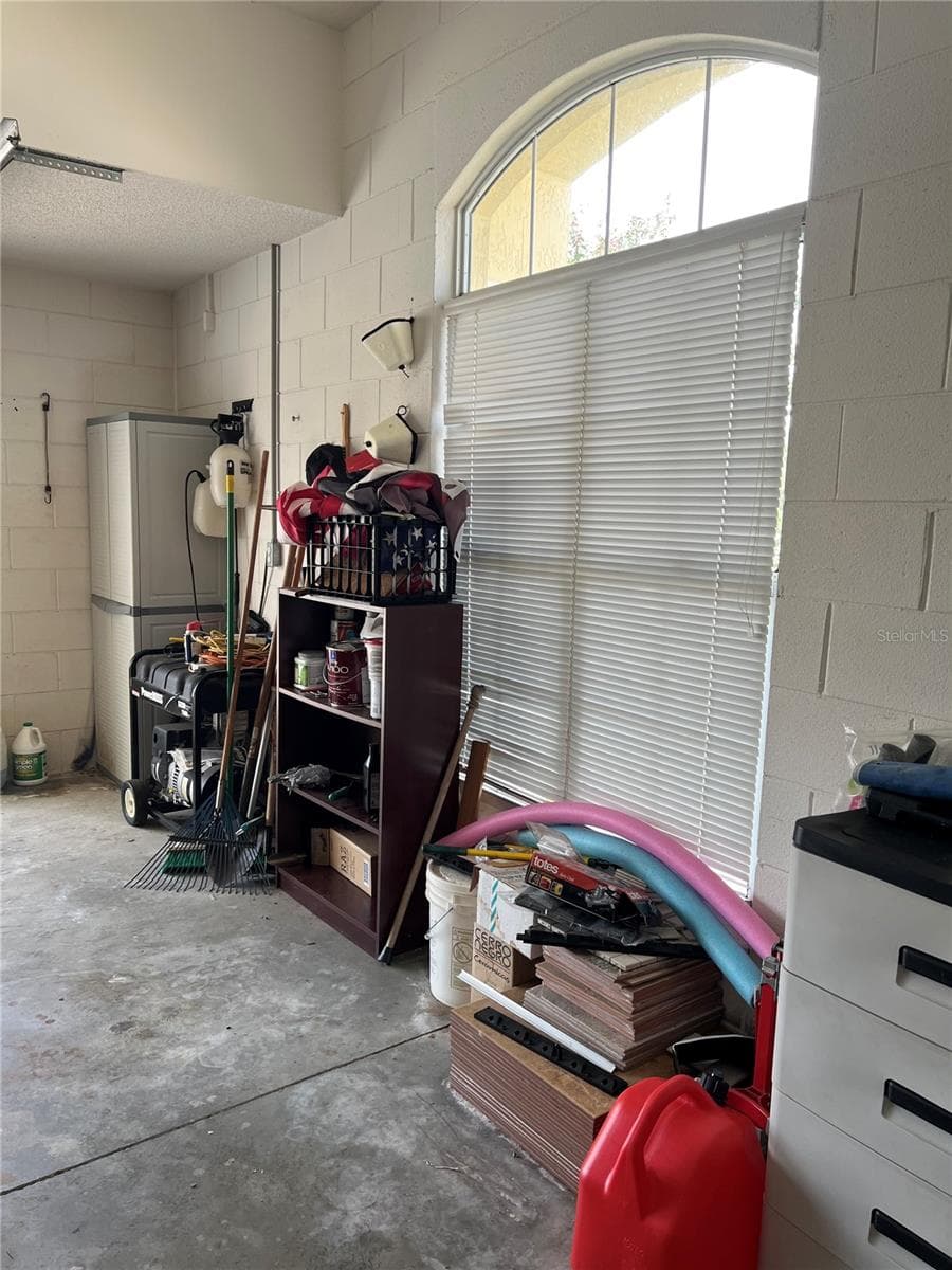 Garage with large window facing Puerto Bello Dr. - 1842 PUERTO BELLO DR, THE VILLAGES