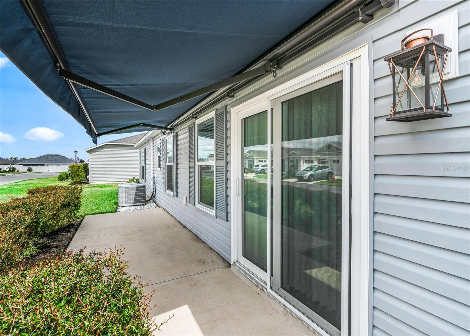 Patio with Retractable Awning - 3250 SHERFINSKI AVE, THE VILLAGES