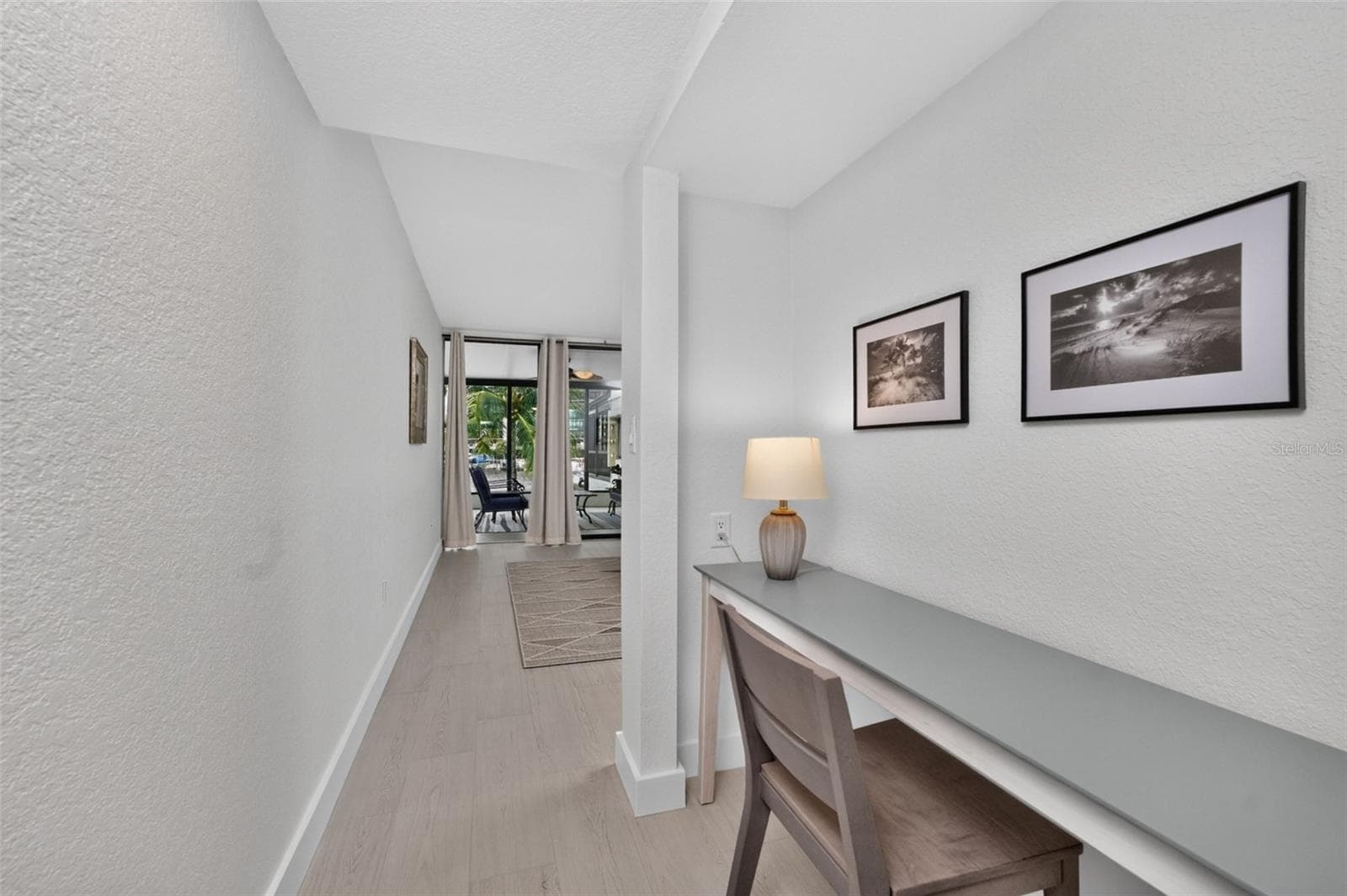Primary Bedroom hallway w/desk - 3250 SOUTHSHORE DR #55B, PUNTA GORDA