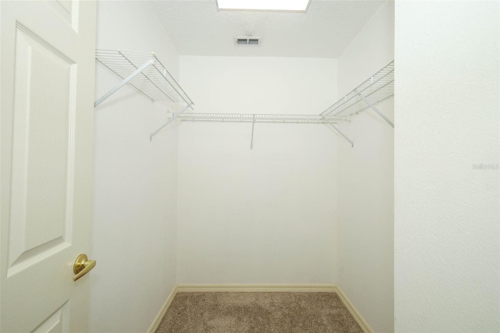 Primary Walk In Closet - 2247 WEKIVA VILLAGE LN, APOPKA