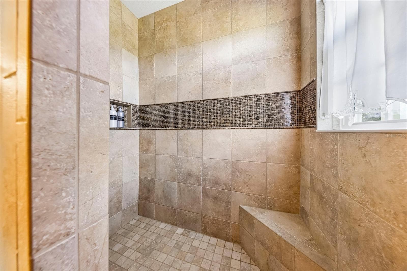 Roman Shower in Primary Bathroom - 2088 NW 102ND BLVD, WILDWOOD