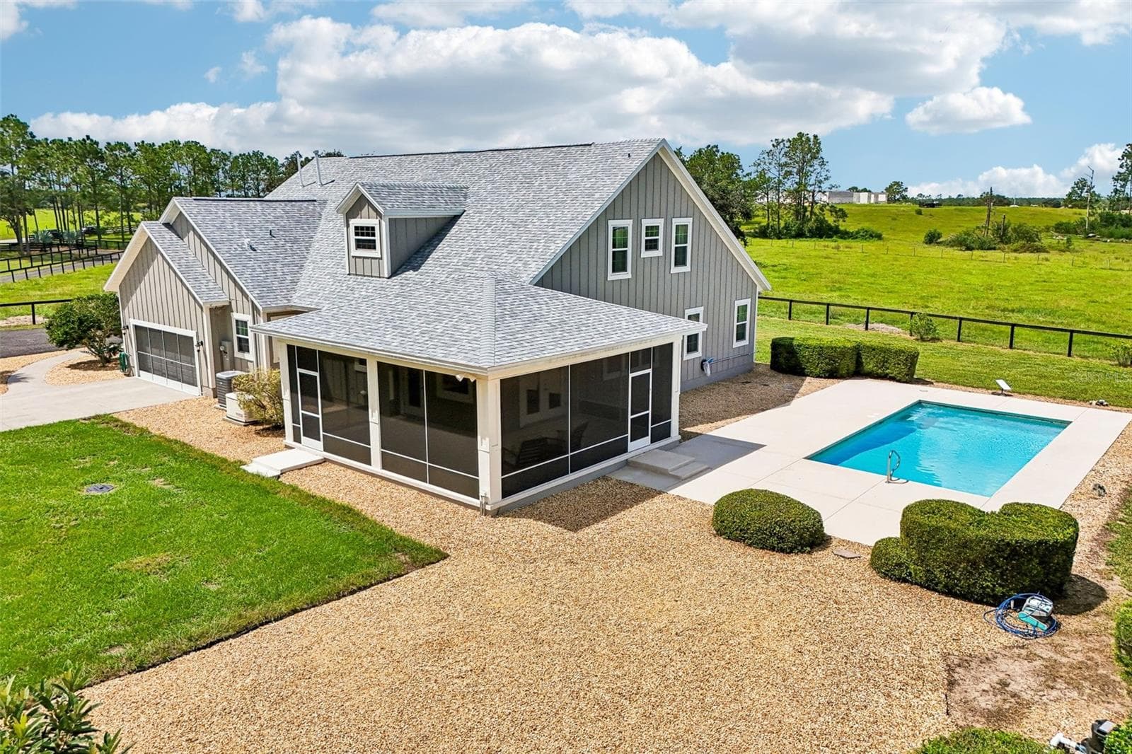 Rear/Side Exterior with Lanai & Pool Area - 2088 NW 102ND BLVD, WILDWOOD