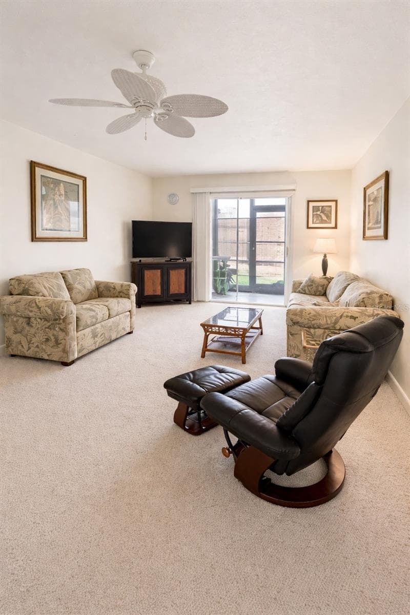 VIRTUALLY ENHANCED LIVINGROOM - 1640 JUNO TRL #103F, ASTOR