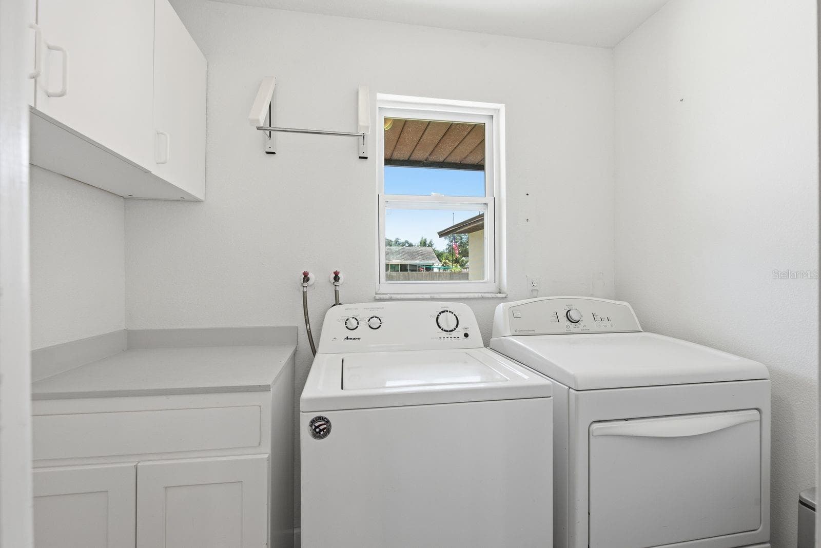 Even the laundry room gets beautiful natural light! - 12620 115TH ST, LARGO