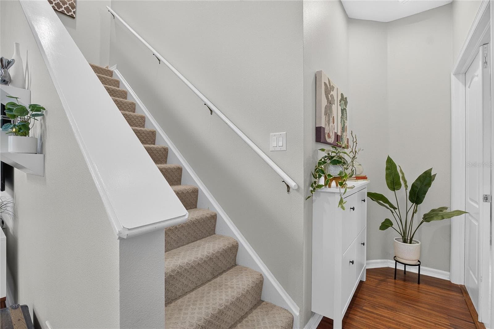 Stairway leads to the second floor featuring a spacious loft, two additional bedrooms and full bath - 10807 SIERRA VISTA PL, TAMPA