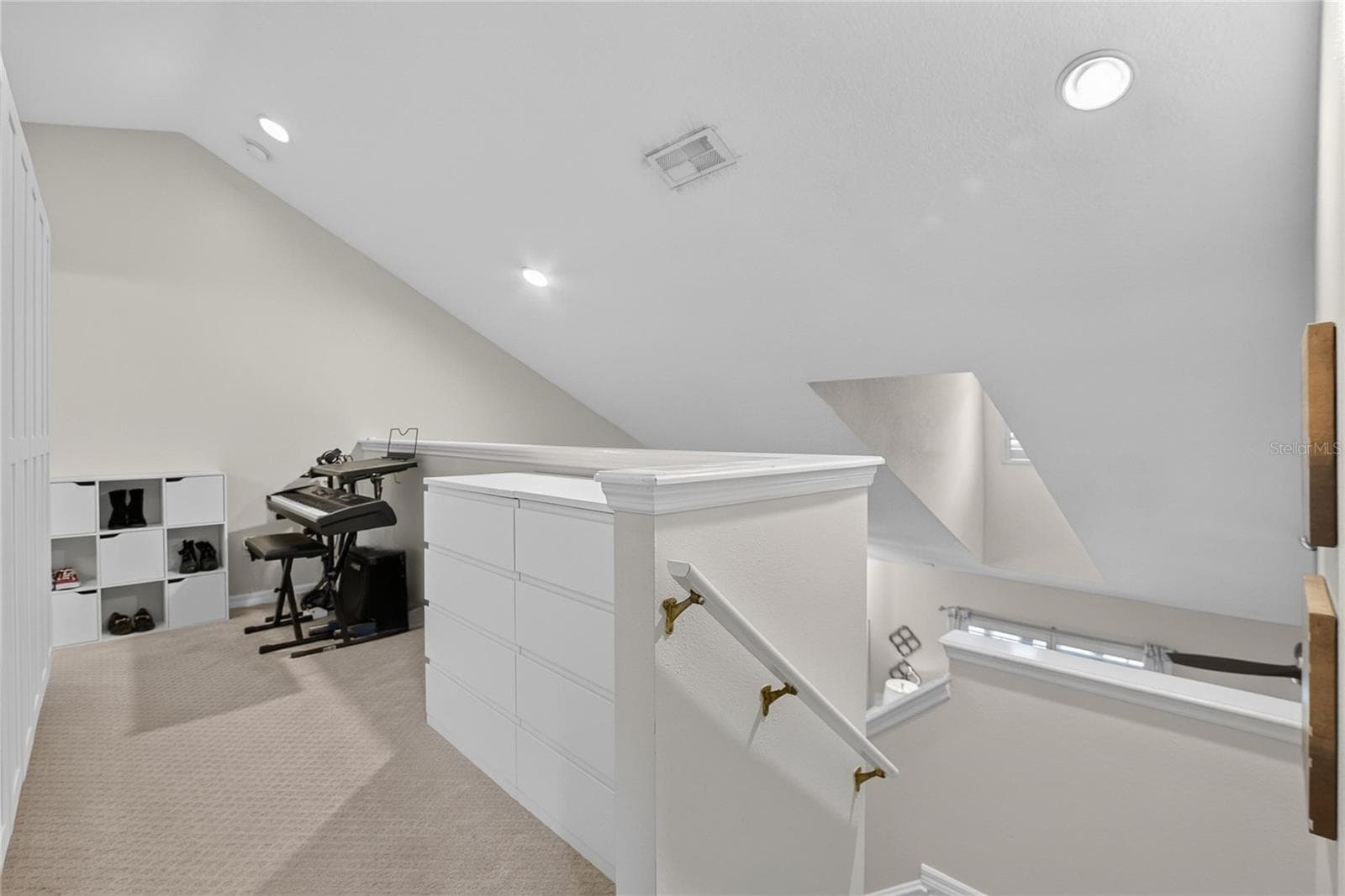 Open second-floor loft provides flexible space for a home office, reading area or hobby space. - 10807 SIERRA VISTA PL, TAMPA