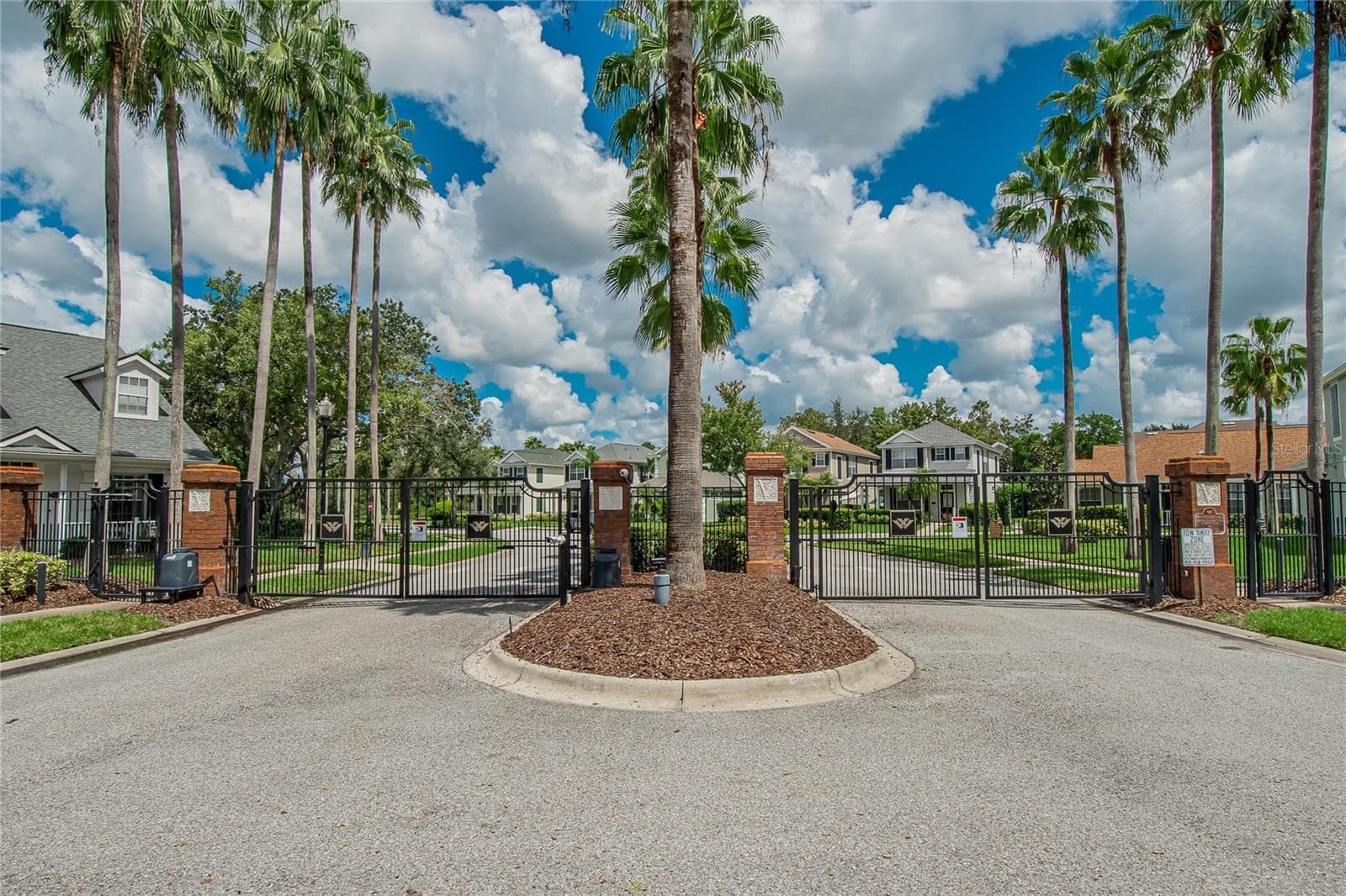 Gated entrance to The Vineyards at Westchase—a beautiful ending to your tour and perhaps the beginning of your next chapter. - 10807 SIERRA VISTA PL, TAMPA