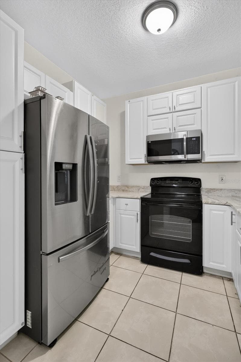 Condominium at 2612 ROBERT TRENT JONES DR #711, ORLANDO, photo 4 of 44