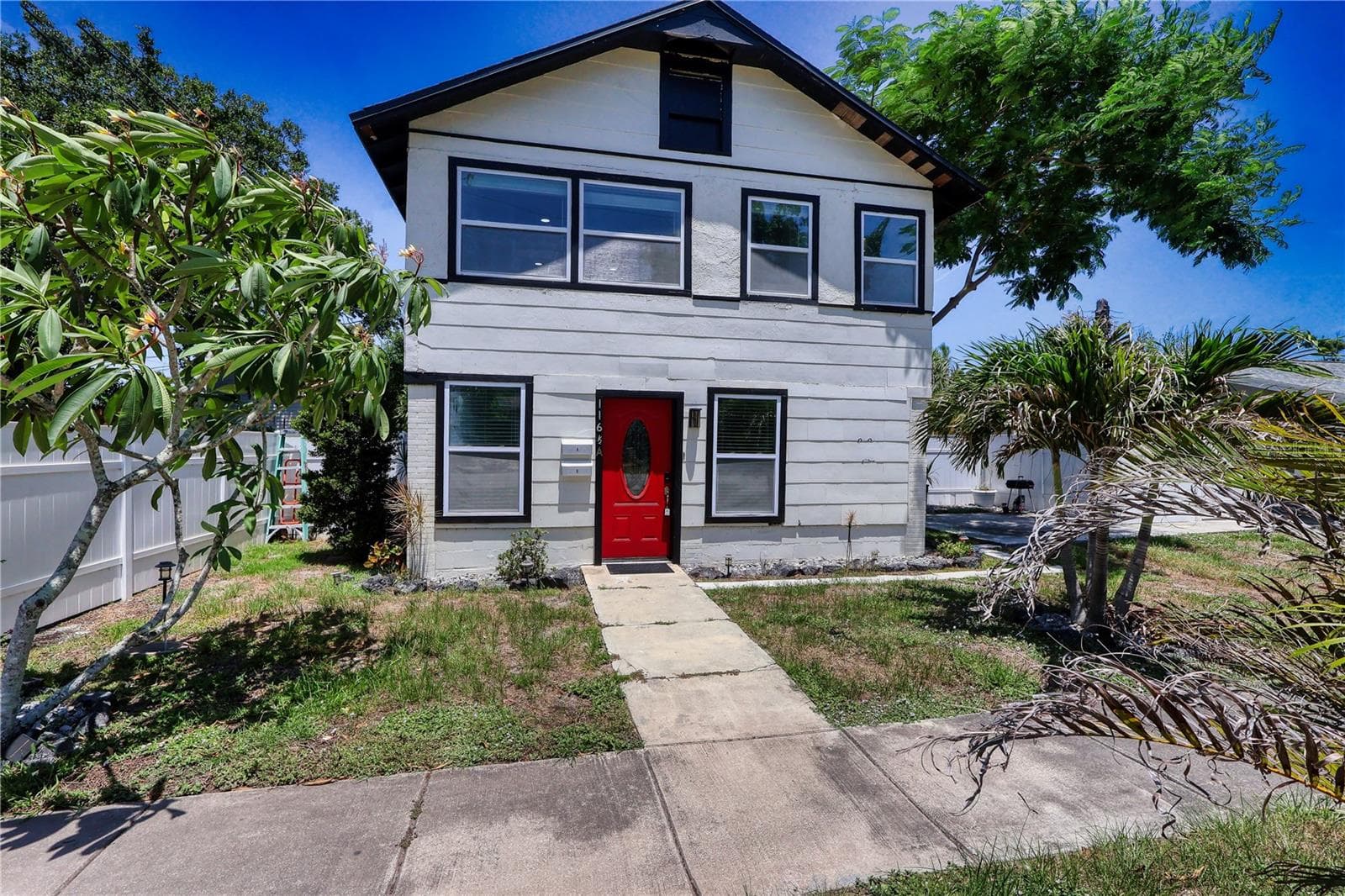 Two-story duplex featuring separate 1-bedroom residences, updated windows and additional rental-income. - 116 44TH ST S, ST PETERSBURG