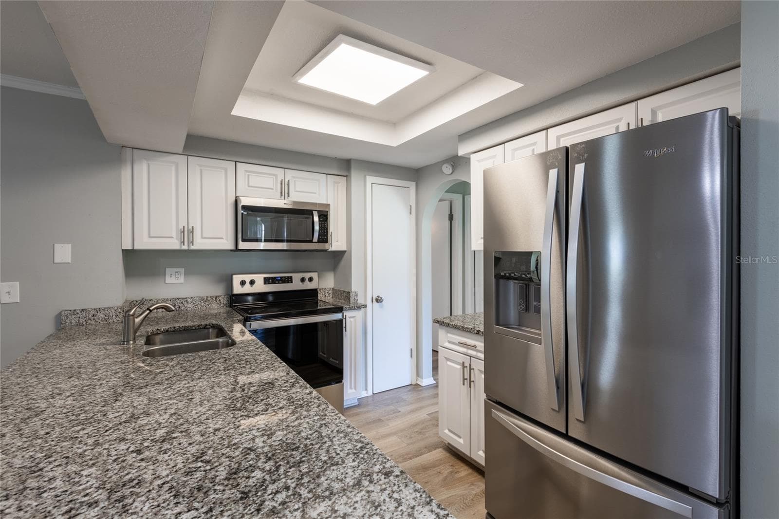 Shaker cabinets with granite counter tops. Newer appliances. - 1257 FINLAND DR, SPRING HILL