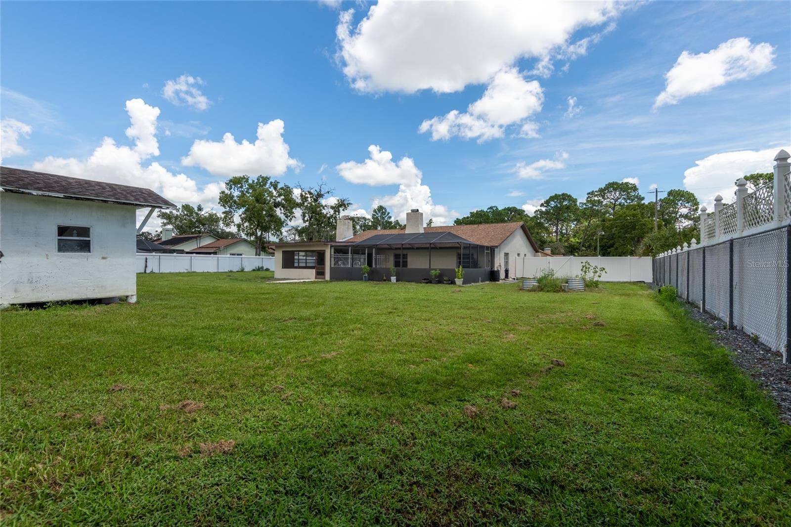 Spacious completely fenced in yard. - 1257 FINLAND DR, SPRING HILL