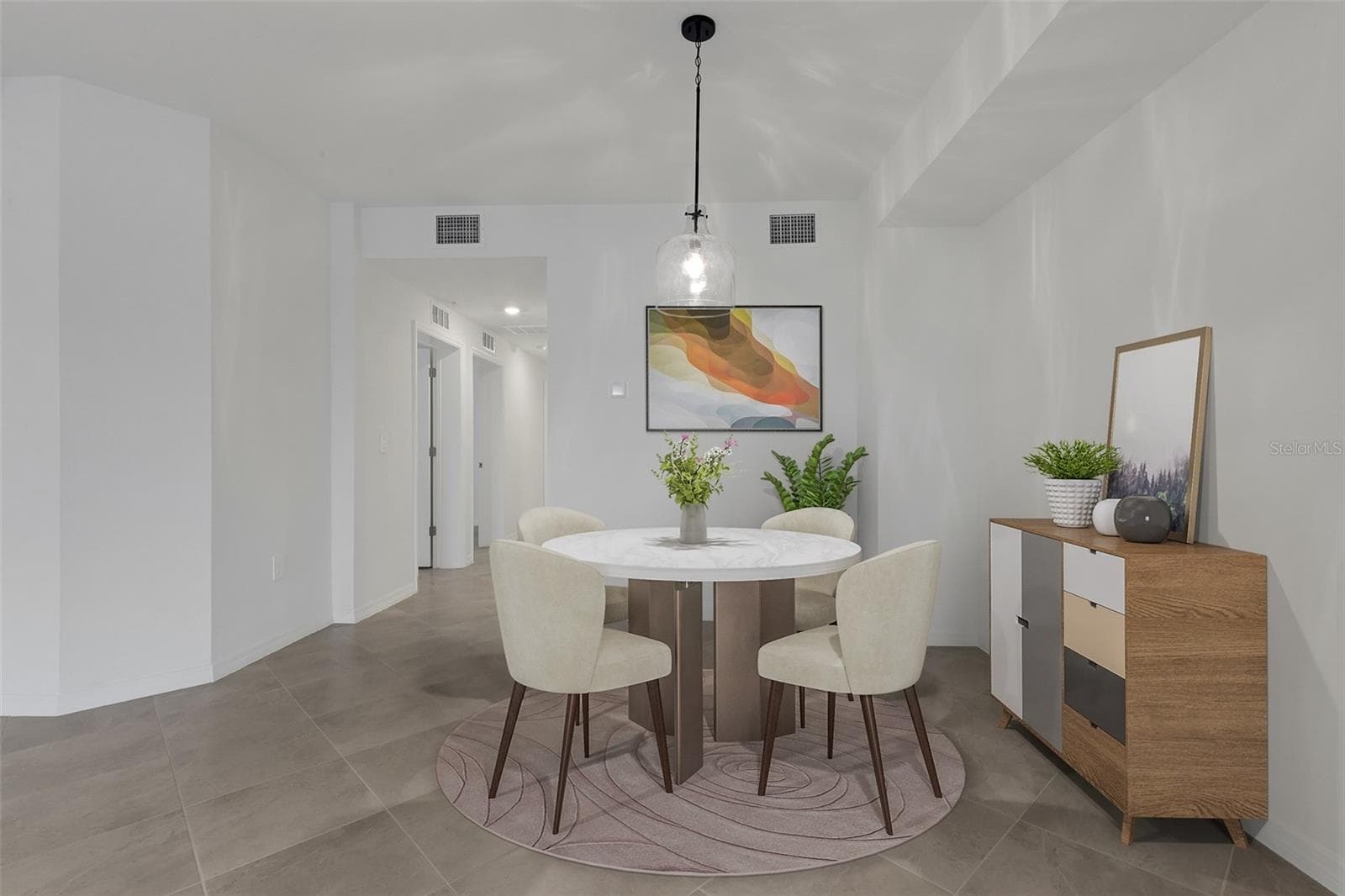Dining V. Staged - 5624 SUMMIT POINTE CIR #104, BRADENTON