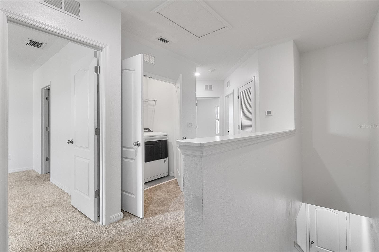 Primary entrance and Laundry - 9033 WILDFLOWER LN, KISSIMMEE