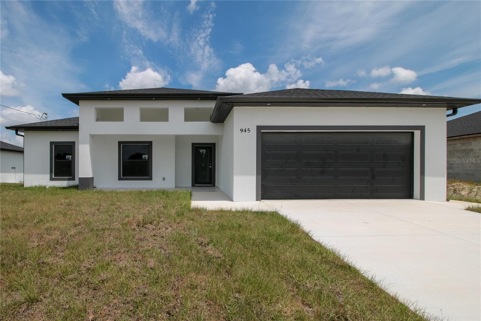Single Family Residence at 945 COMMODORE ST, LEHIGH ACRES, photo 2 of 25
