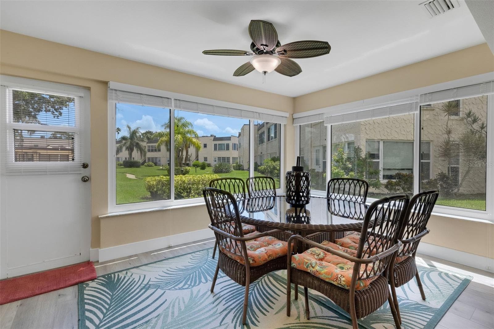Florida Room with Pedestrian Door to Walkway to Pool and Clobhouse - 112 ELMWOOD CIR #112, SEMINOLE