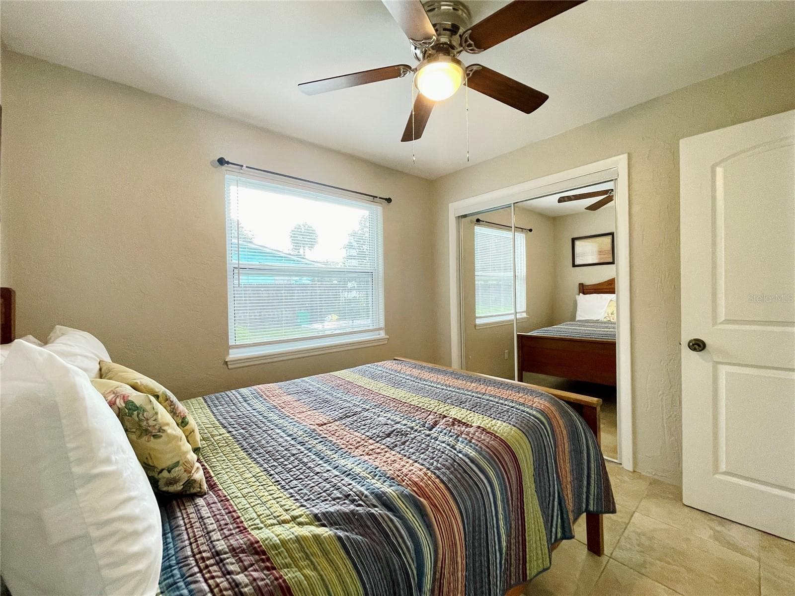 Another view of the bright bedroom with ample closet space. - 723 STEELE AVE, SOUTH DAYTONA