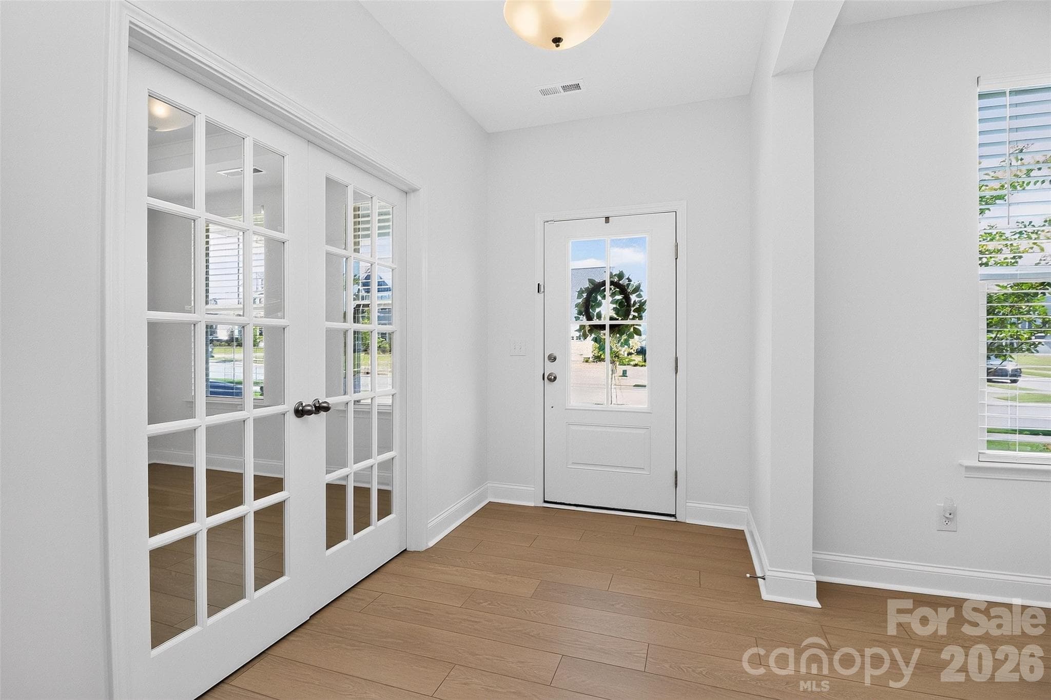 Entryway w/ French doors to office - 235 Supernova Drive, York