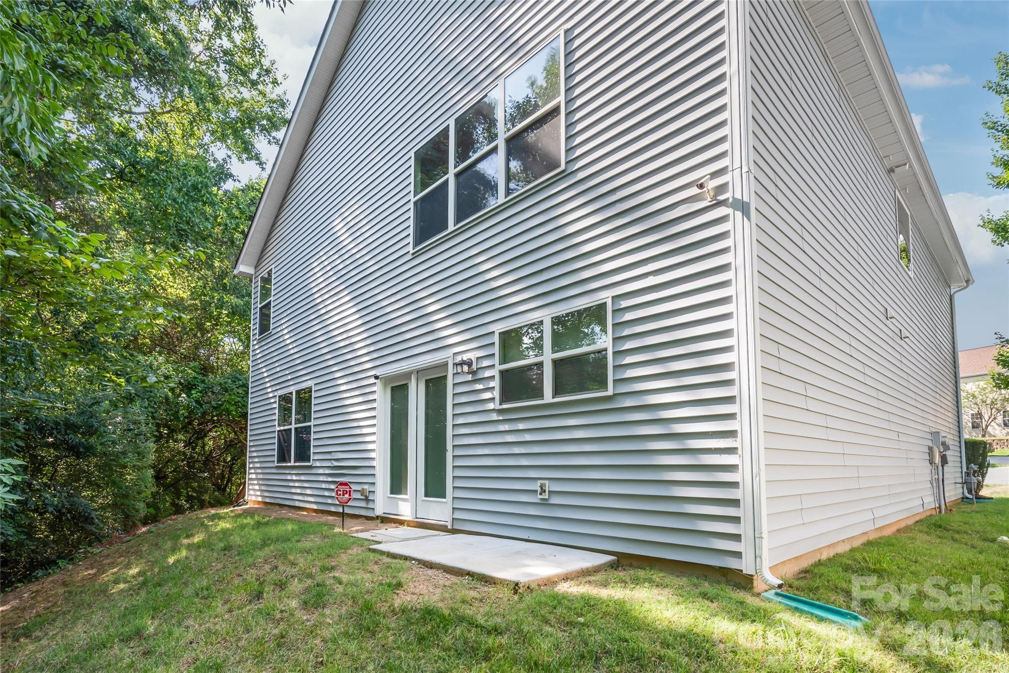 "This backyard offers low-maintenance living and exceptional privacy thanks to the surrounding mature trees, providing a versatile space with endless possibilities." - 6404 Lanzerac Manor Drive, Charlotte