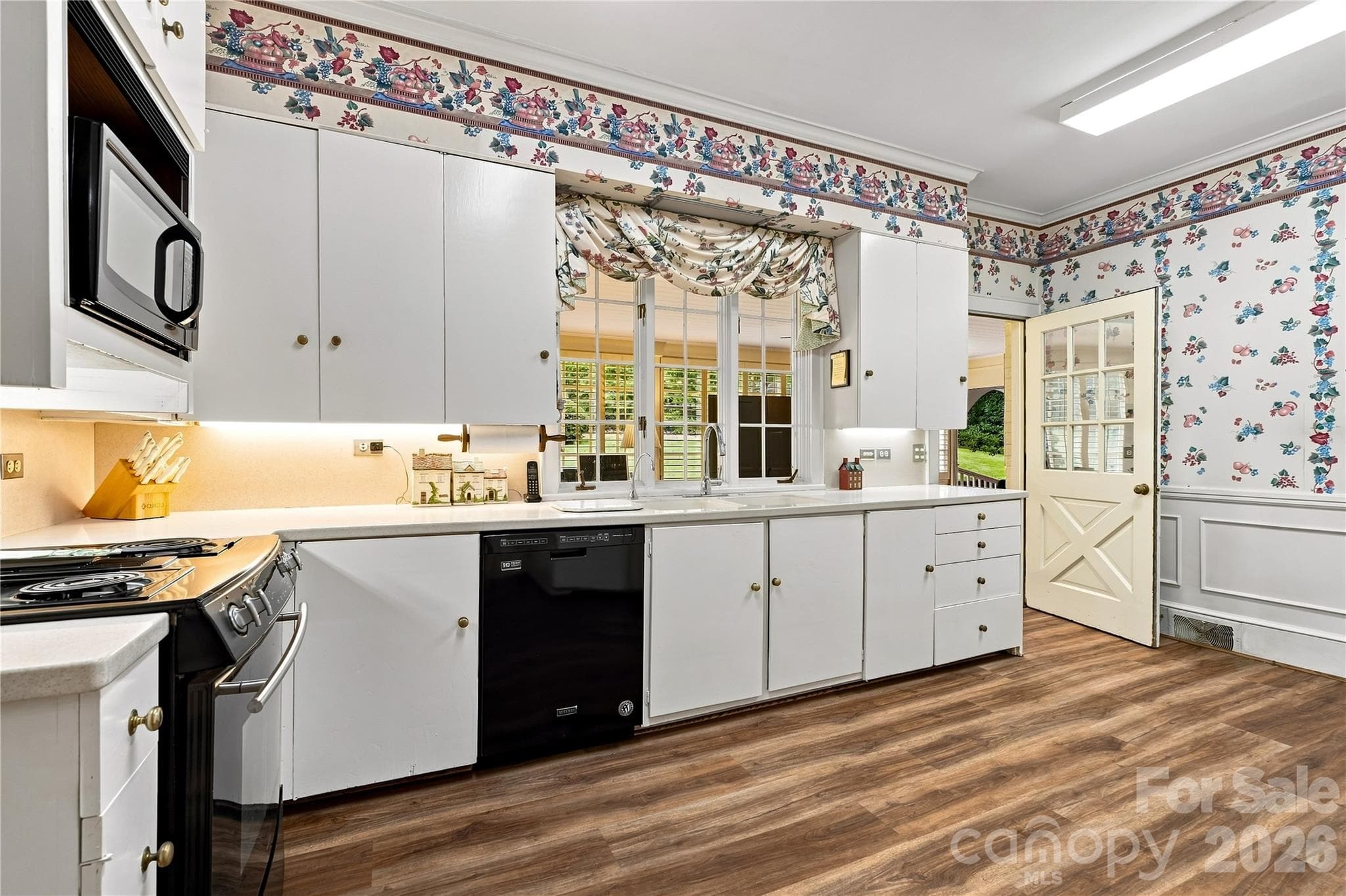 Spacious kitchen with abundant cabinetry and storage. - 209 Labans Lane, Lincolnton