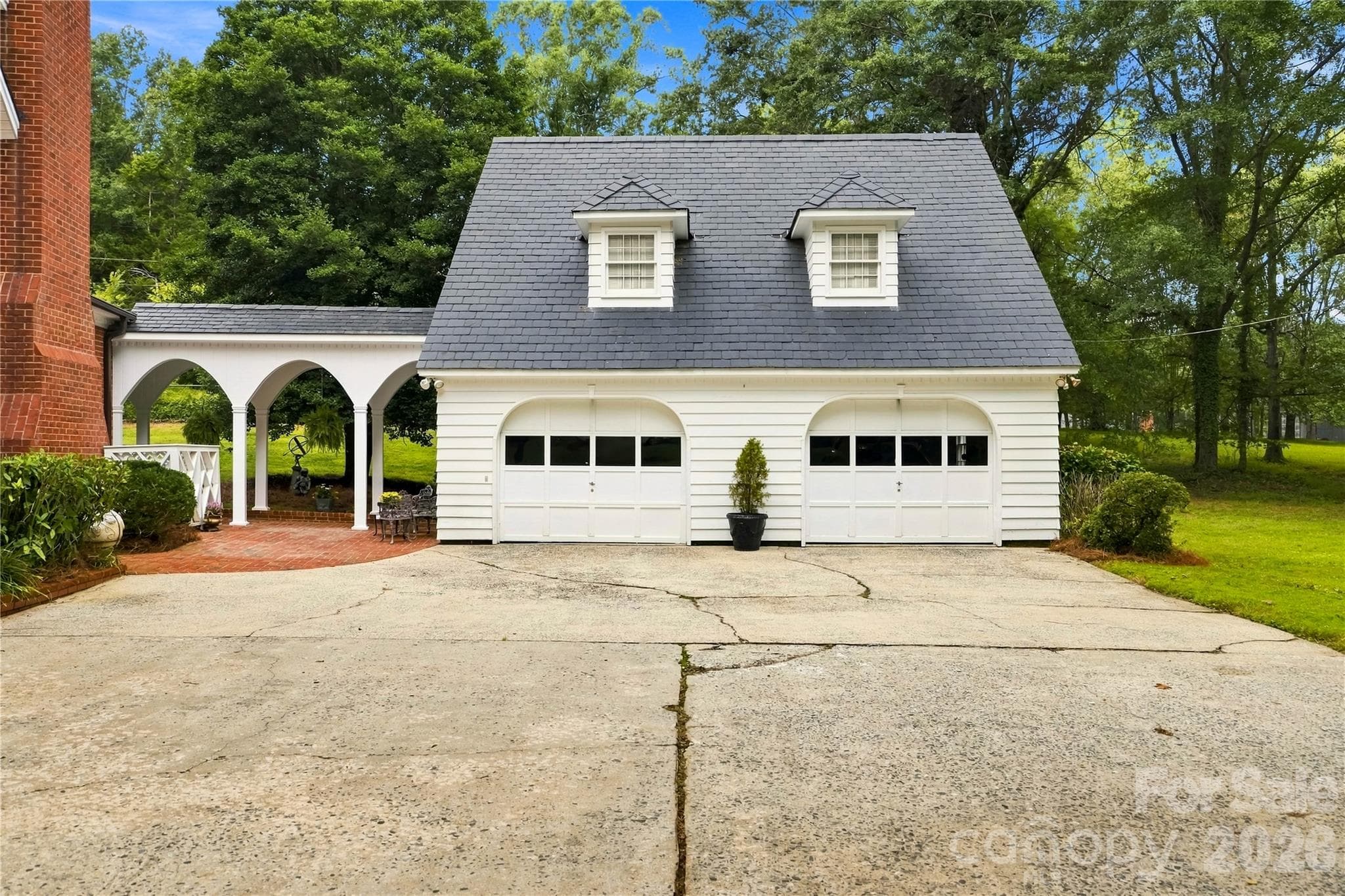 Detached two-car garage with additional storage above. - 209 Labans Lane, Lincolnton