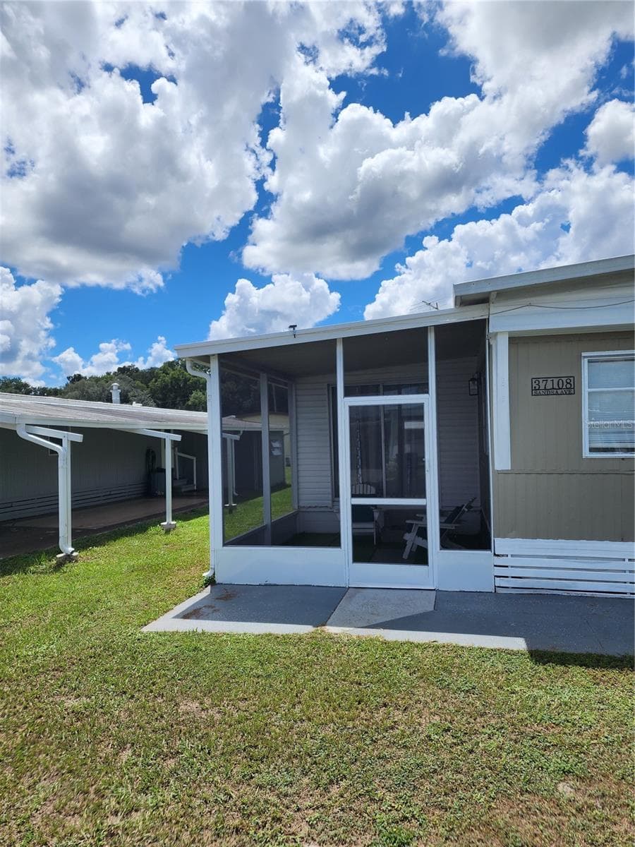 Mobile Home at BETMAR ACRES, ZEPHYRHILLS, photo 2 of 23